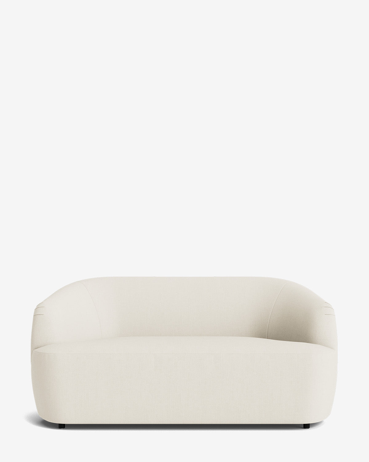 The Byron Settee 68 features a modern, minimalist cream design with curved arms and a low back, smooth rounded edges, and is shown against a plain white background for an elegant, contemporary look by McGee & Co.