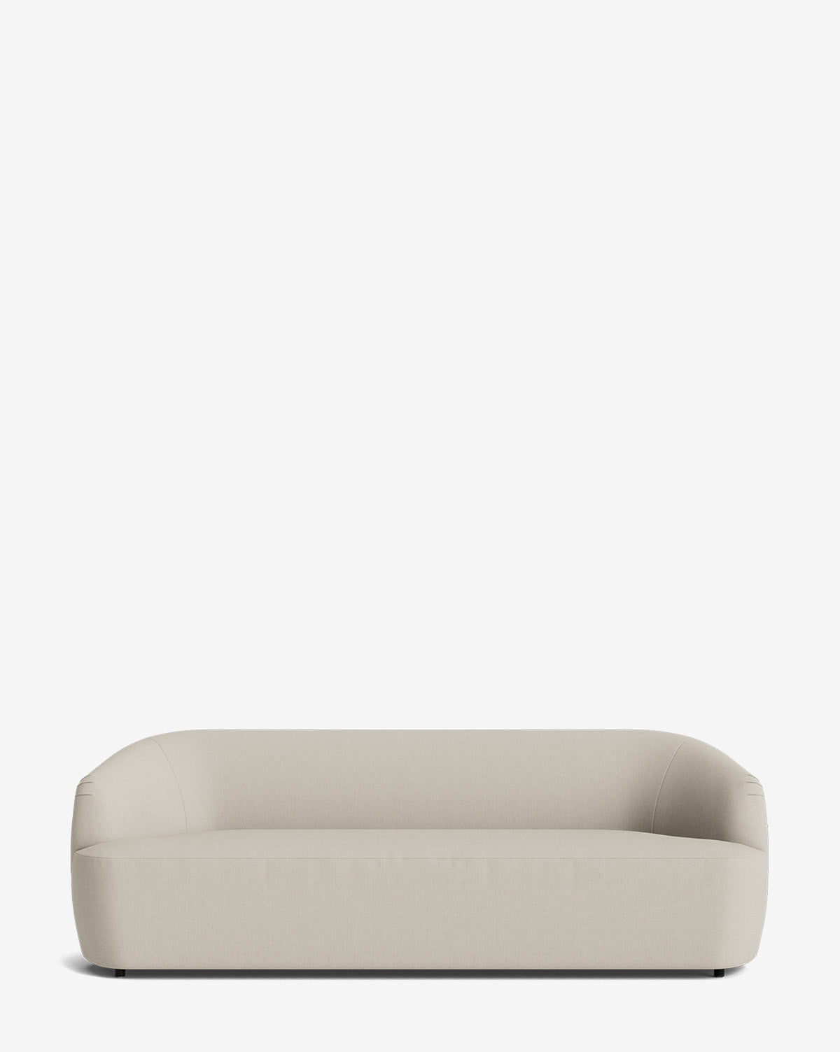 The Byron Sofa 96 features a modern, minimalist design with rounded arms and a low back—ideal as a custom fabric sofa for contemporary spaces, by McGee & Co.