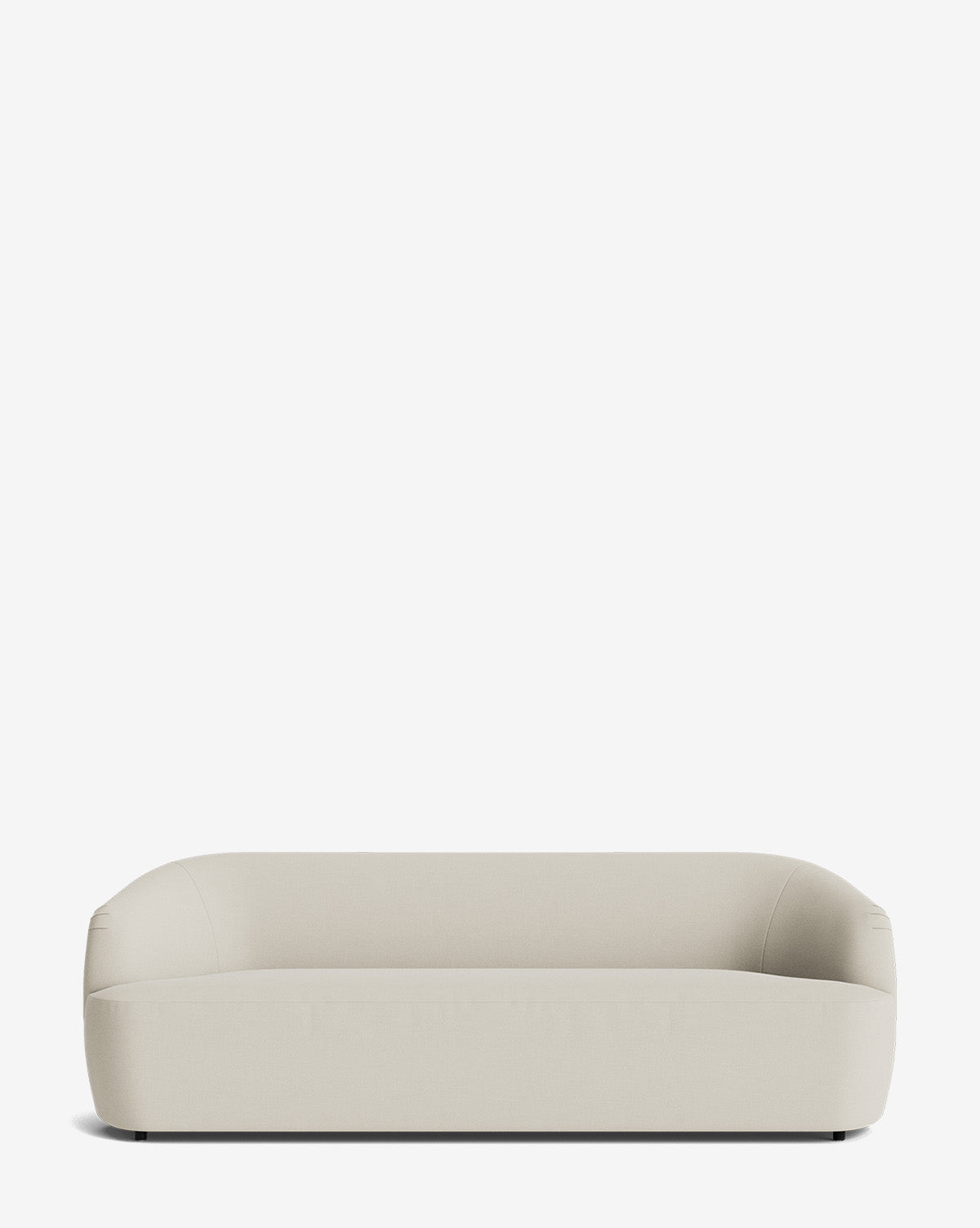 Byron Sofa 96 in beige, featuring a minimalist, modern design with rounded edges, low backrest, smooth custom fabric upholstery, and hidden legs for a sleek look, set against a plain white background by McGee & Co.