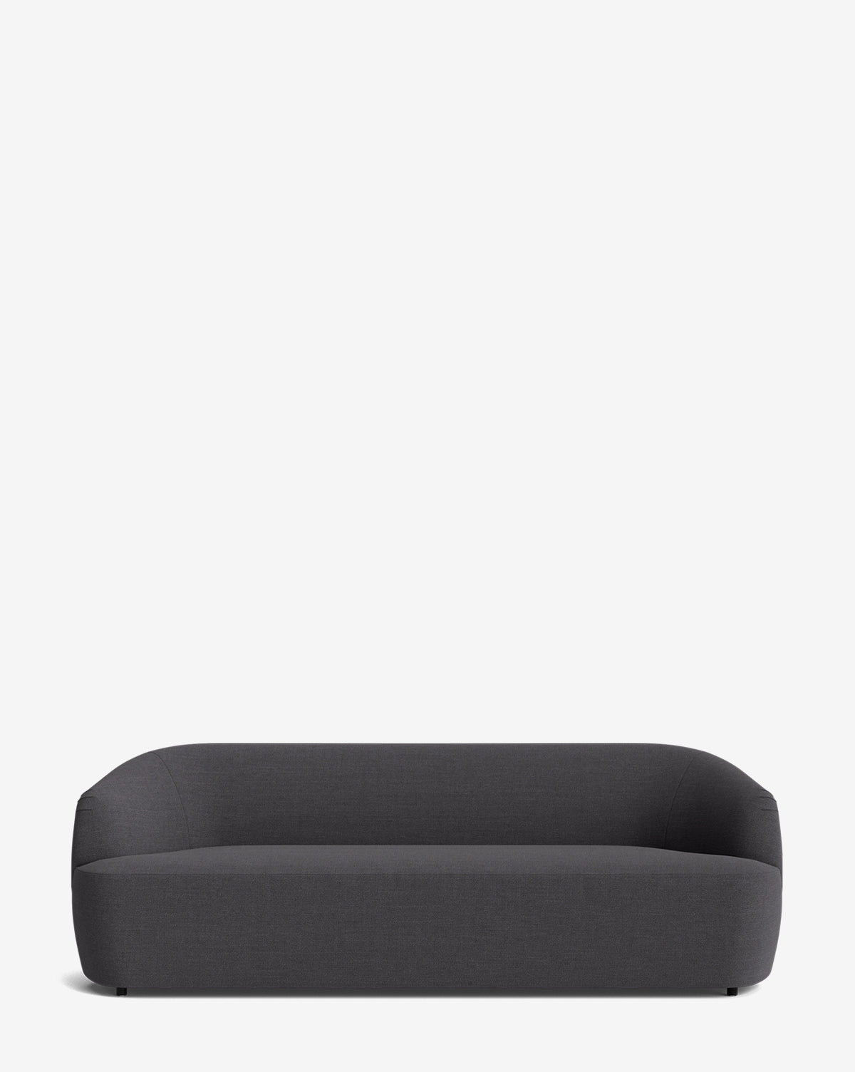 The Byron Sofa 96 features a modern, minimalist design in dark gray fabric with rounded edges and a low profile, set against a plain white background, by McGee & Co.