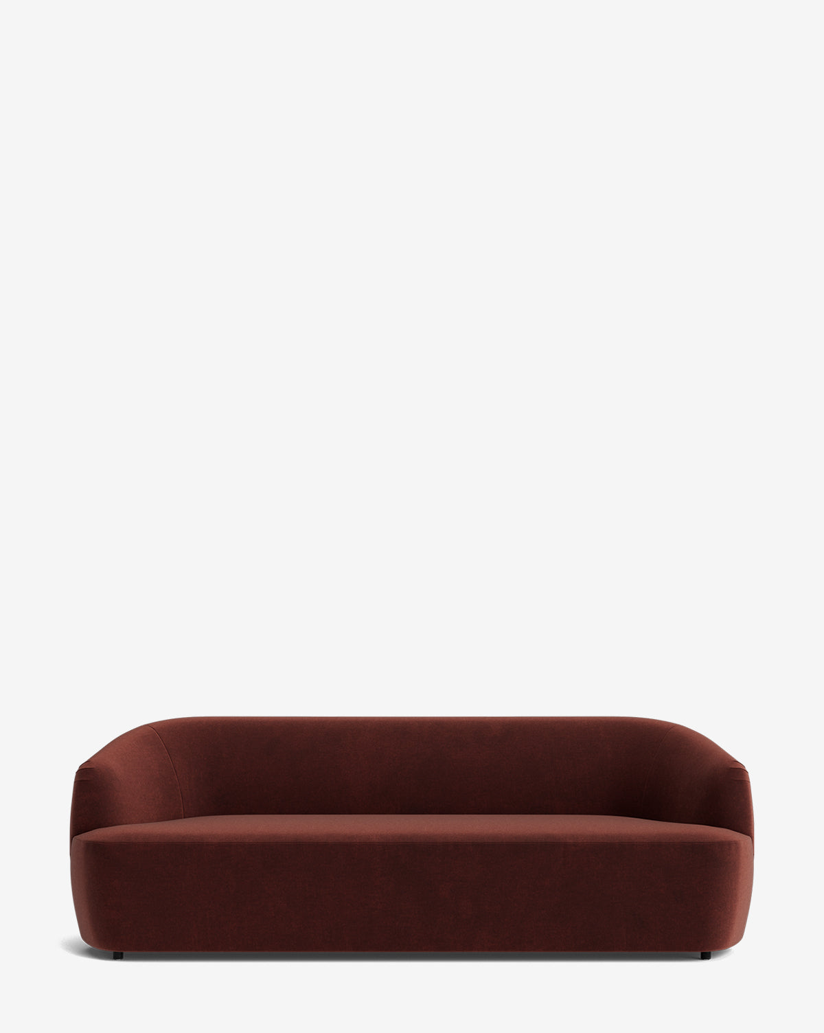 The Byron Sofa 96 in deep brown boasts a modern, minimalist design with a low, curved back and rounded edges, displayed against a plain white background by McGee & Co.