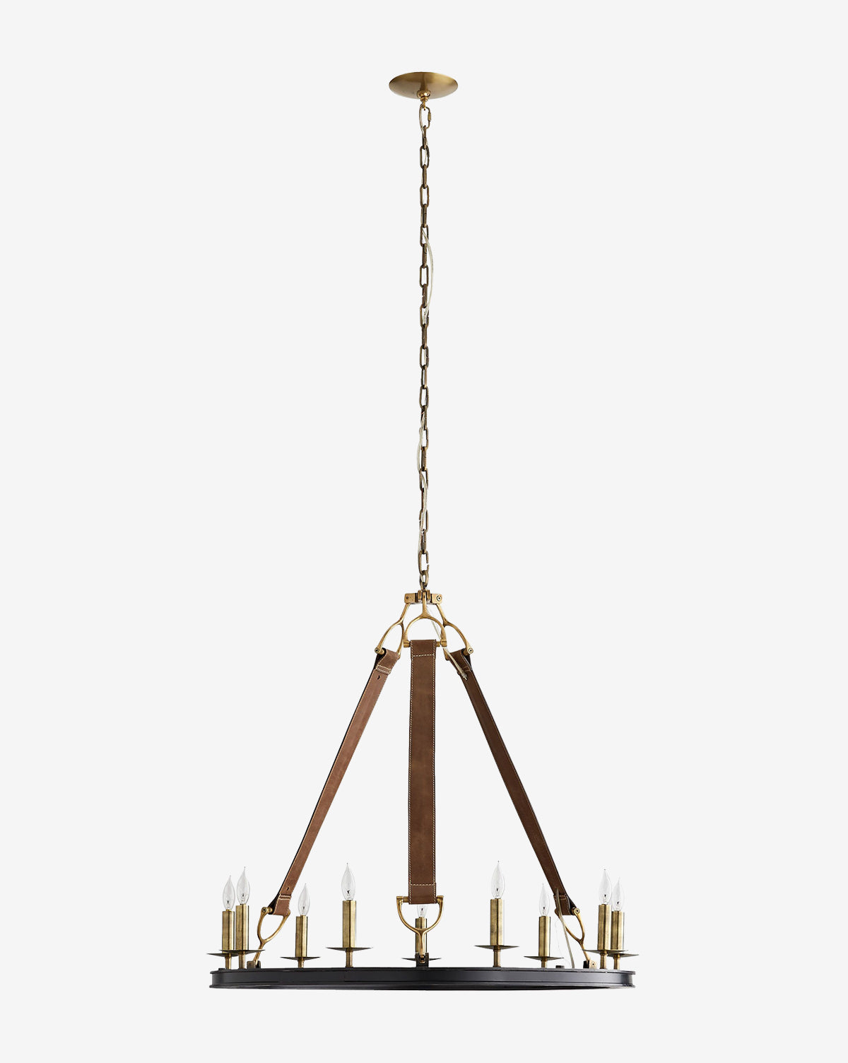 The Arteriors Chaney Chandelier showcases a round black bronze ring with eight candle-style bulbs, suspended by brown leather bands and brass hardware from a matching chain and ceiling mount against a white background. McGee & Co.
