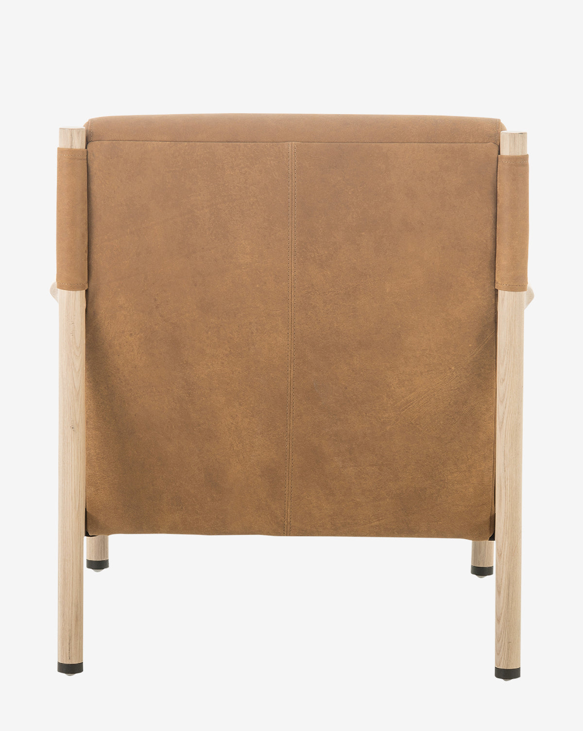 The Channing Lounge Chair in tan leather, shown from the back with light wooden legs against a white background, boasts Parisian design and a durable high-performance upholstered seat for lasting comfort and style, by McGee & Co.