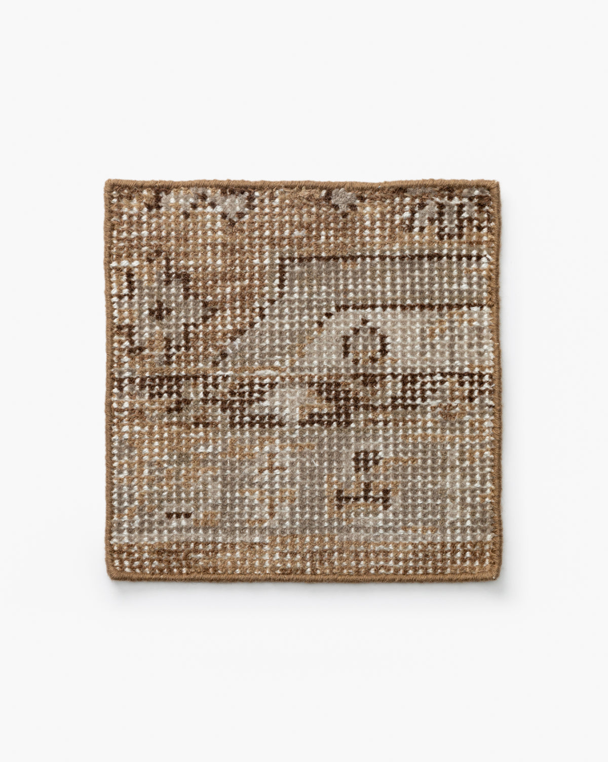 The Charlot Hand-Knotted Rug Swatch is a square, artisan piece in beige and brown, featuring a pixelated geometric pattern with subtle color and texture variations on a white background by McGee & Co.