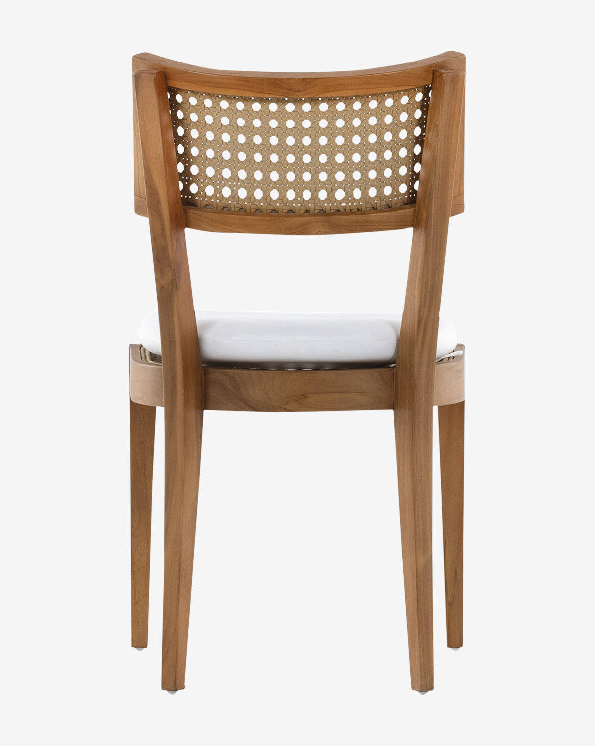 The Chester Outdoor Dining Chair features a sturdy teak frame, woven cane backrest, and white UV-resistant cushion, shown from the back against a white background by McGee & Co.
