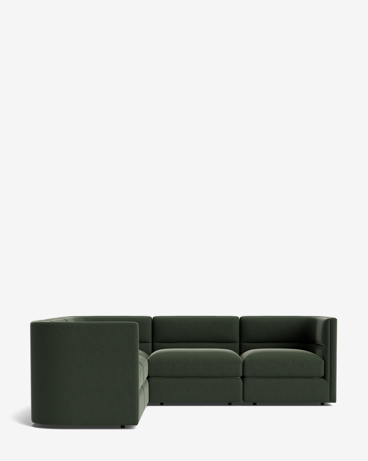 The Makerspalm Claremont Modular L Sectional 99 in dark green features low backs, wide seats, and a clean, minimalist L-shaped design, set against a plain white background. McGee & Co.
