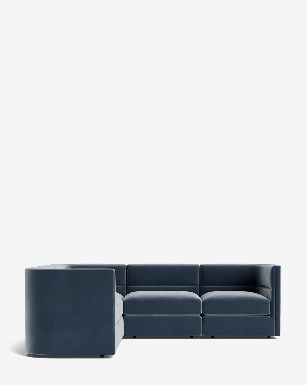 The Claremont Modular L Sectional 99 features dark blue upholstery, clean lines, and low boxy cushions in an L-shape, shown against a plain white background, by McGee & Co.