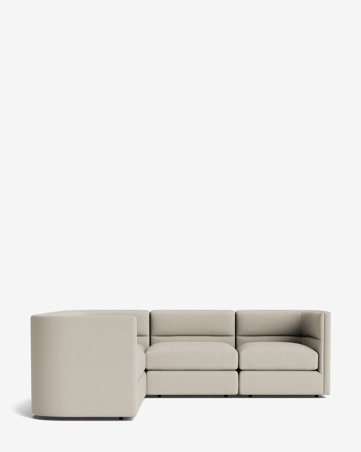 A modern Claremont Modular L Sectional 99 in light beige, featuring clean lines and low-profile cushions, set against a plain white background by McGee & Co.