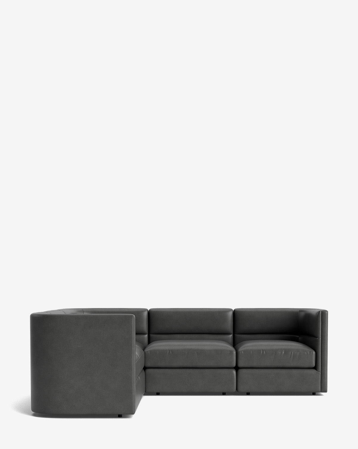 The Claremont Modular L Sectional 99 in dark gray leather has three seat cushions and low square armrests, arranged in an L-shape against a plain white background by McGee & Co.