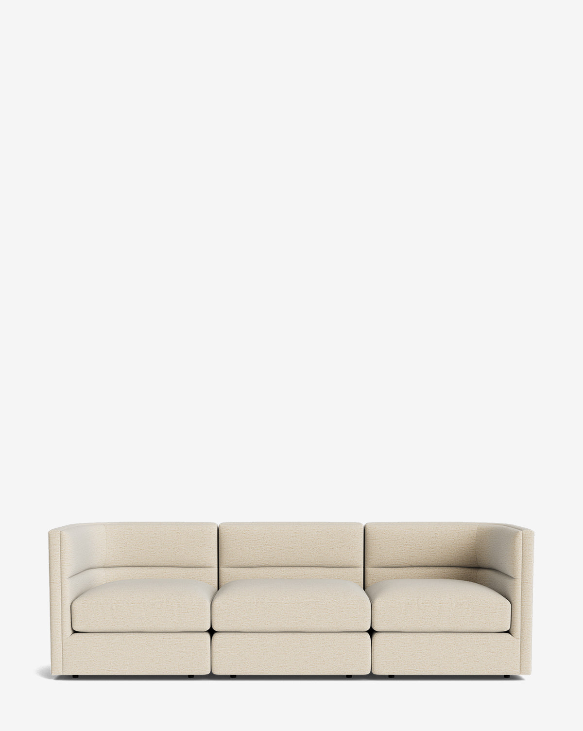 The Makerspalm Claremont Modular Sofa 99 features a modern, vintage-inspired design with light beige customizable fabric and low-profile curved arms, shown on a plain white background. McGee & Co.