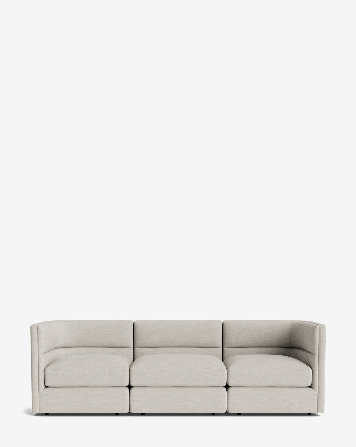 The Claremont Modular Sofa 99 is a modern, light gray three-seat sectional with clean lines and low-profile backrests, delivering luxurious comfort against a plain white background, by McGee & Co.