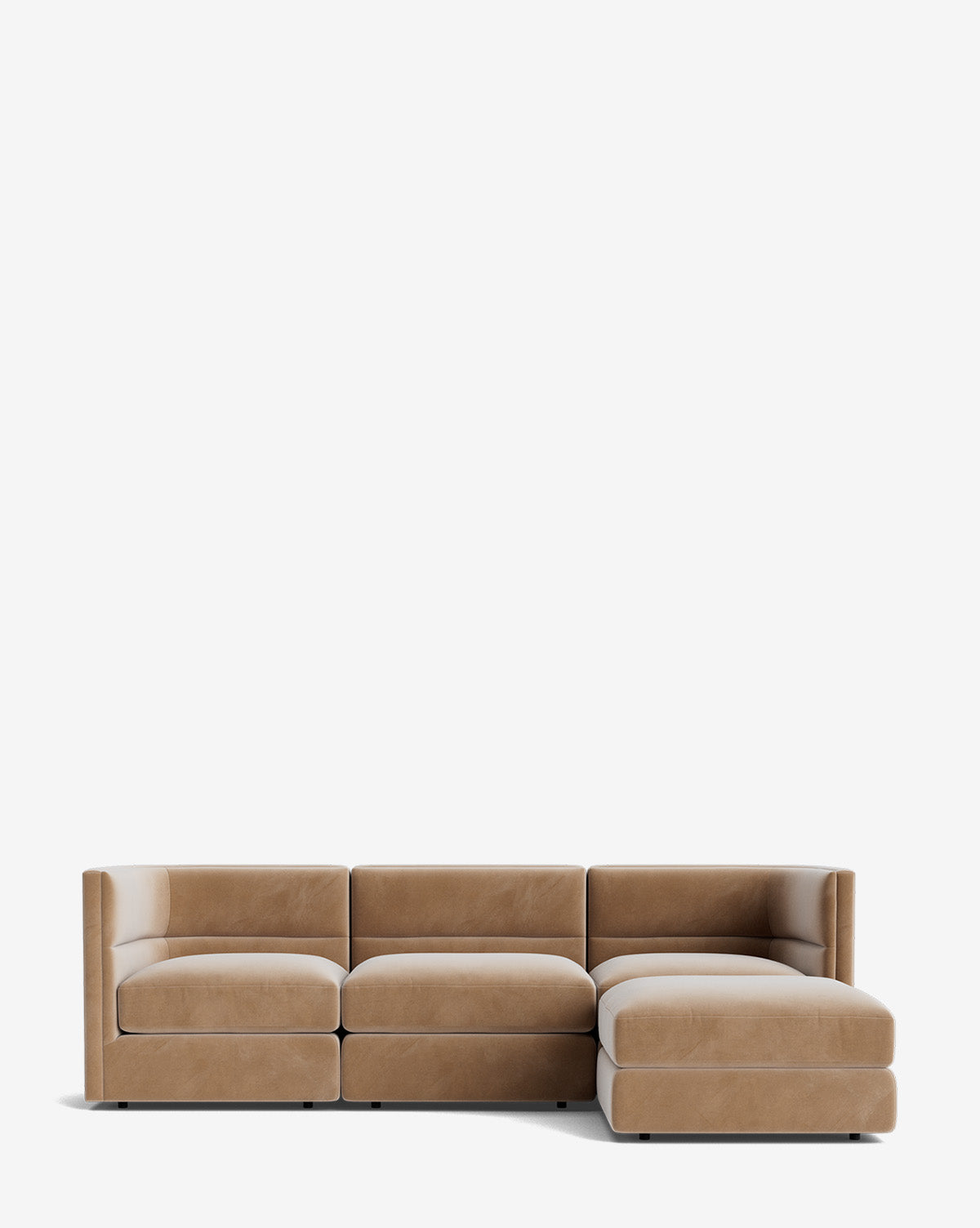 The Claremont Modular Sofa with Ottoman 99 is a modern tan sofa with clean lines, low-profile cushions, three seats, and a right-side chaise lounge, shown against a plain white background by McGee & Co.