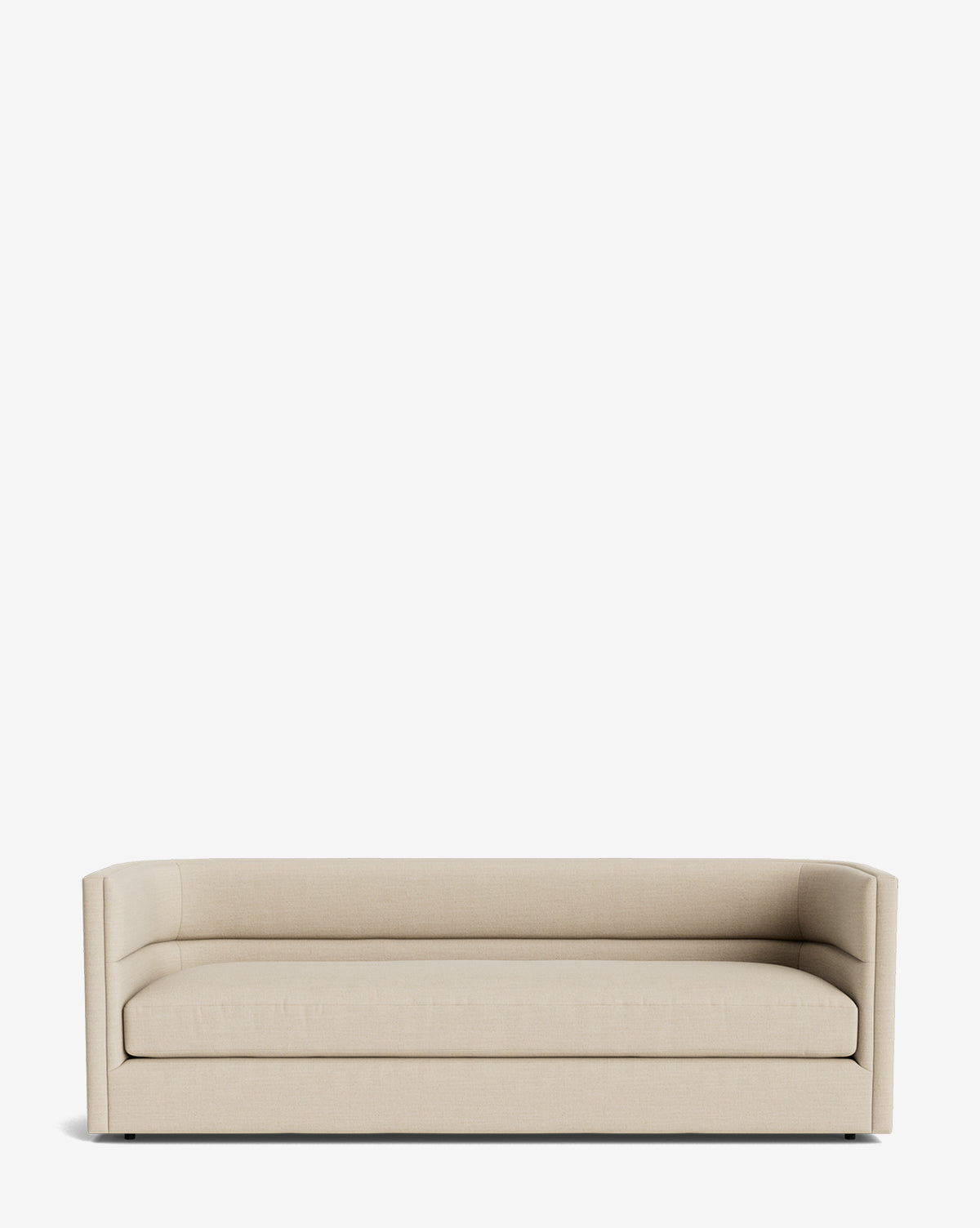 The Claremont Sofa 84 features a modern beige design with clean lines, low arms, and a straight backrest, crafted from high-quality fabric and displayed against a plain white background by McGee & Co.