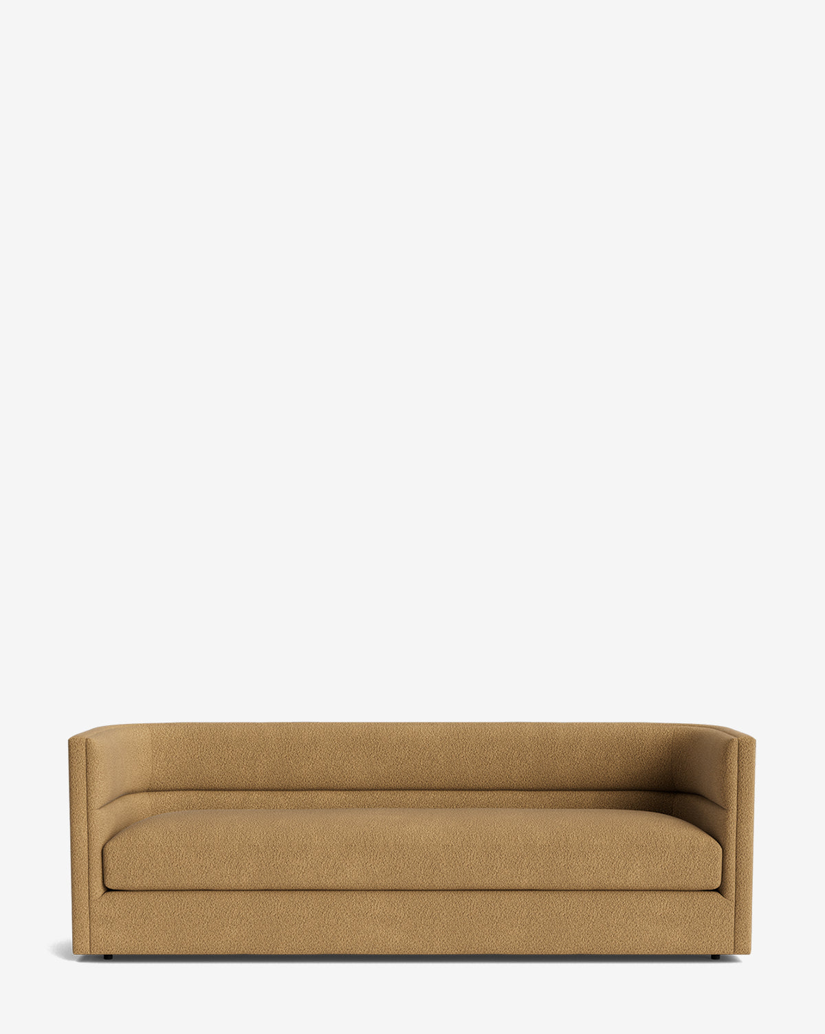 The Claremont Sofa 84 features a modern, minimalist boxy design with low armrests and premium fabric, shown elegantly against a plain white background by McGee & Co.