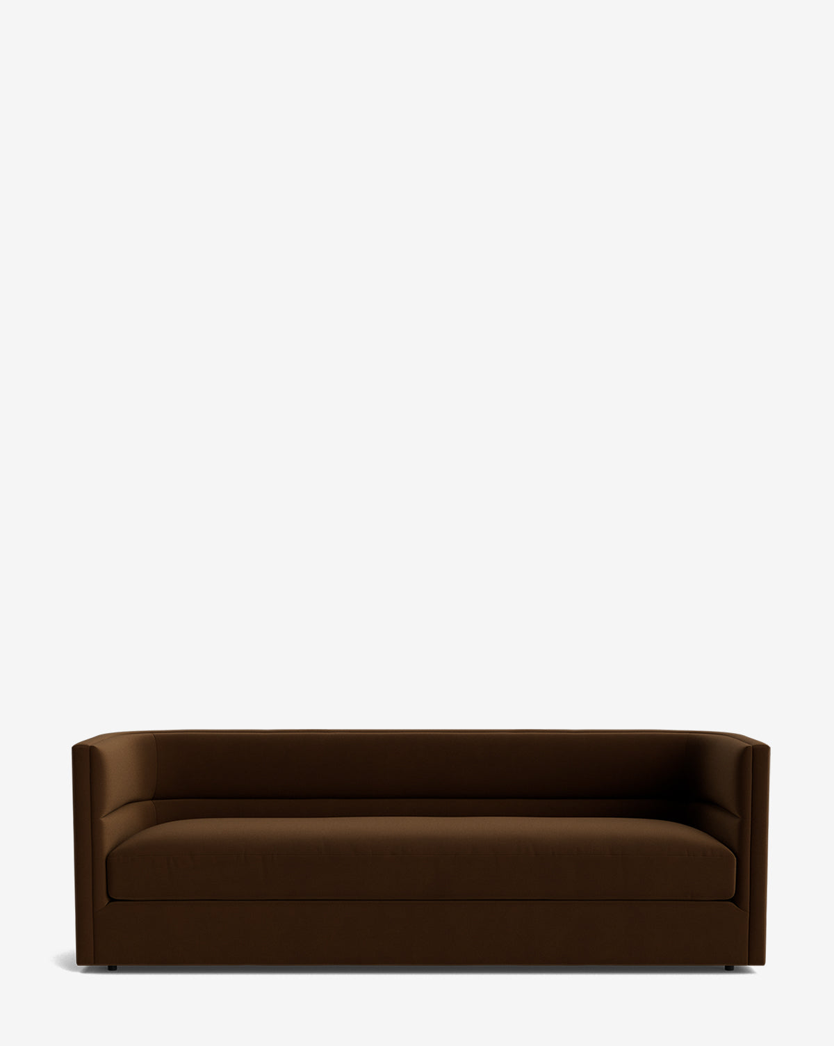 The Claremont Sofa 84 features a modern, dark brown design with clean lines, low armrests, and high-quality fabric upholstery, displayed against a plain white background by McGee & Co.