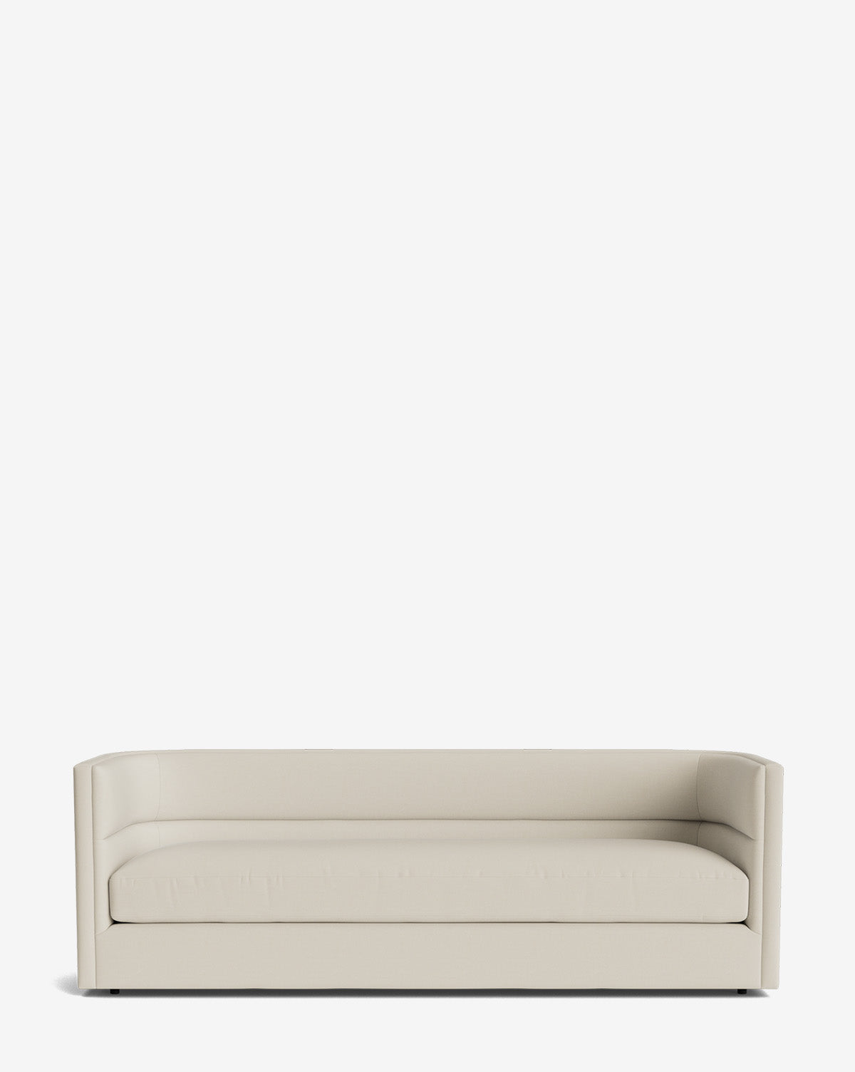 The Claremont Sofa 84 features a modern, low-profile design with straight arms and beige high-quality fabric, shown against a plain white background, by McGee & Co.