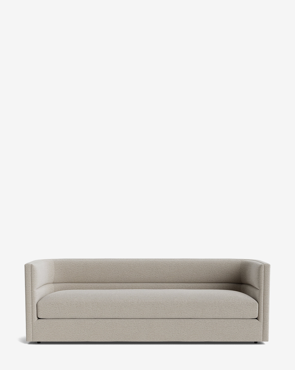 A modern, minimalist Claremont Sofa 84 in beige, crafted from high-quality fabric with low armrests and a straight backrest, displayed against a plain white background by McGee & Co.