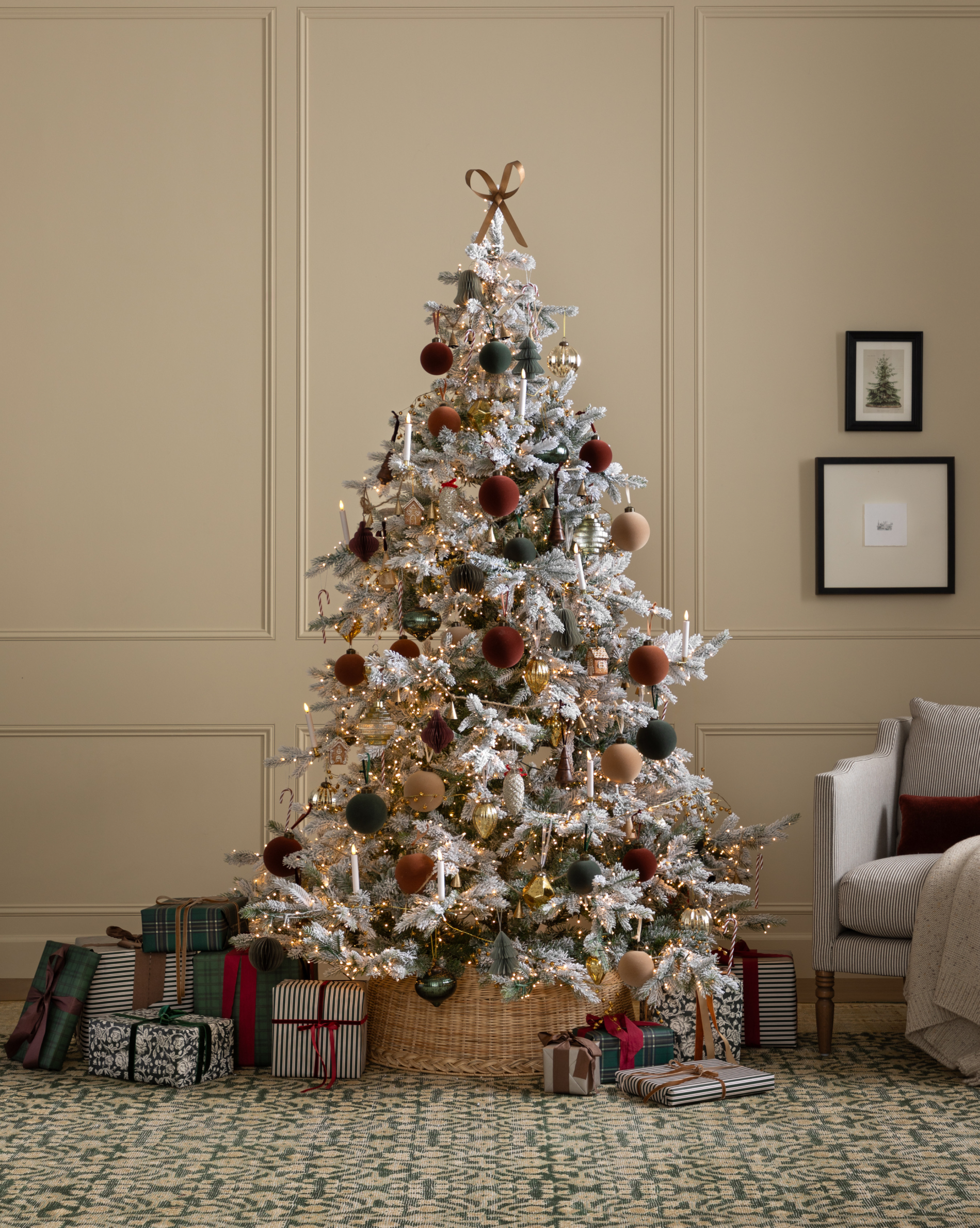 The DUPE TEST CLASSIC CHRISTMAS HOLIDAY TREE BUNDLE, complete with a classic topper and nostalgic decorations, surrounded by presents, creates a timeless Christmas decor scene, by McGee & Co.