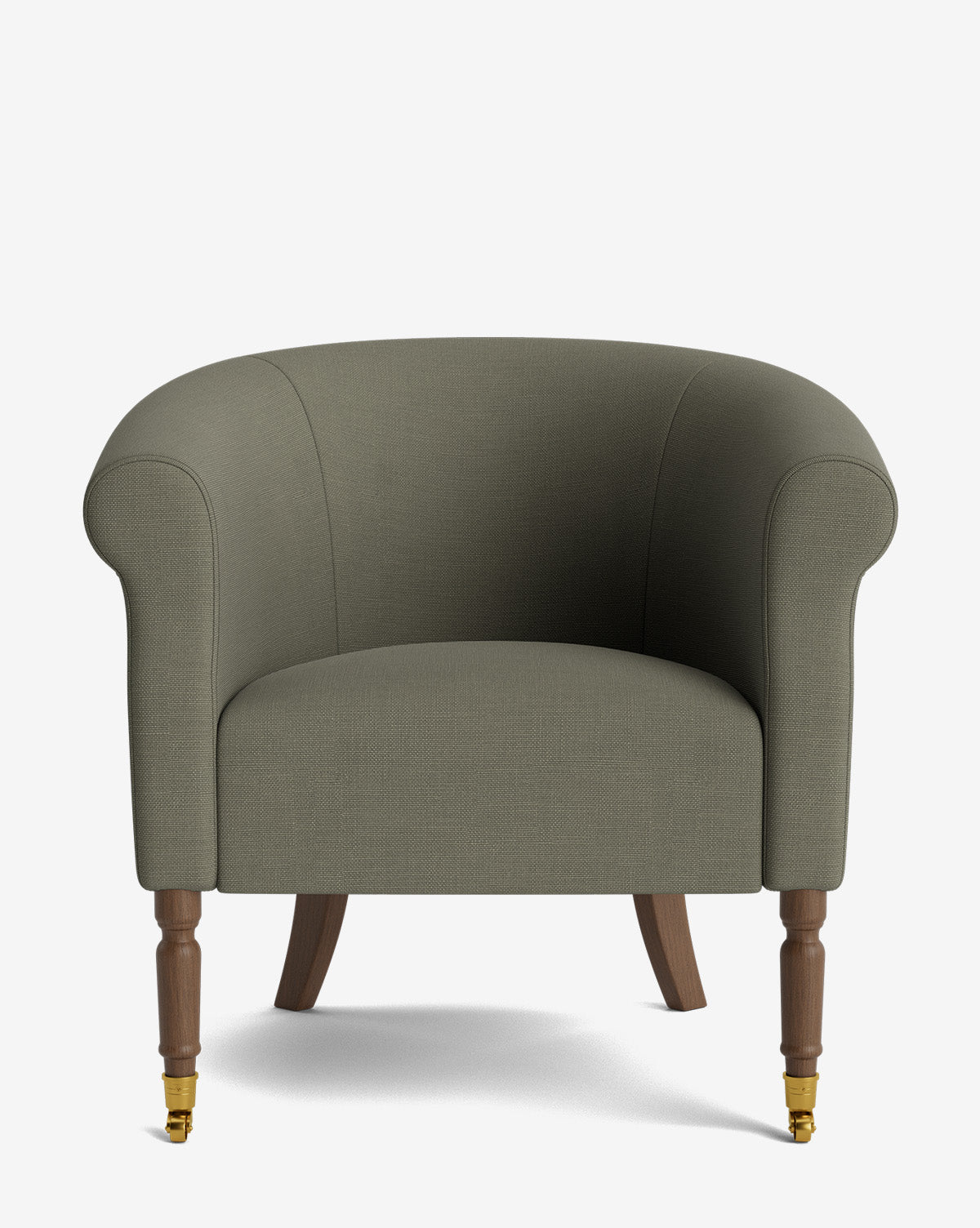 The Clemence Lounge Chair is a green upholstered armchair with rounded arms, a curved back, and wooden legs with brass caster wheels—combining comfort and designer style for your living room, by McGee & Co.