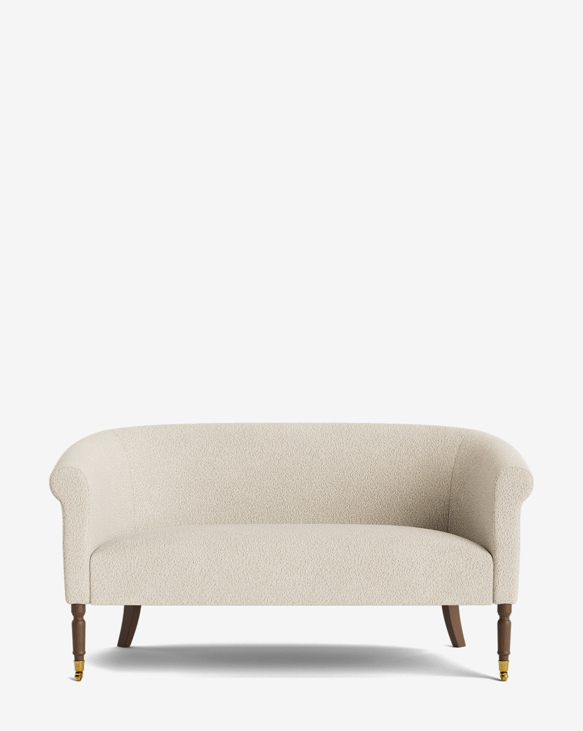 The Clemence Settee 60 by Makerspalm features beige upholstery, curved arms, wooden legs, and brass castor front feet, adding elegance to any living space. Shown against a plain white background. McGee & Co.