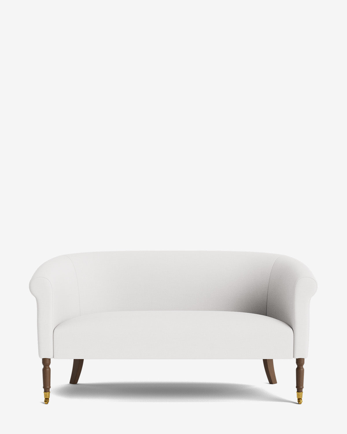 The Clemence Settee 60 features designer white fabric, a curved back, wooden legs, and front brass caster wheels—an elegant addition to any living space, by McGee & Co. Displayed on a plain white background.