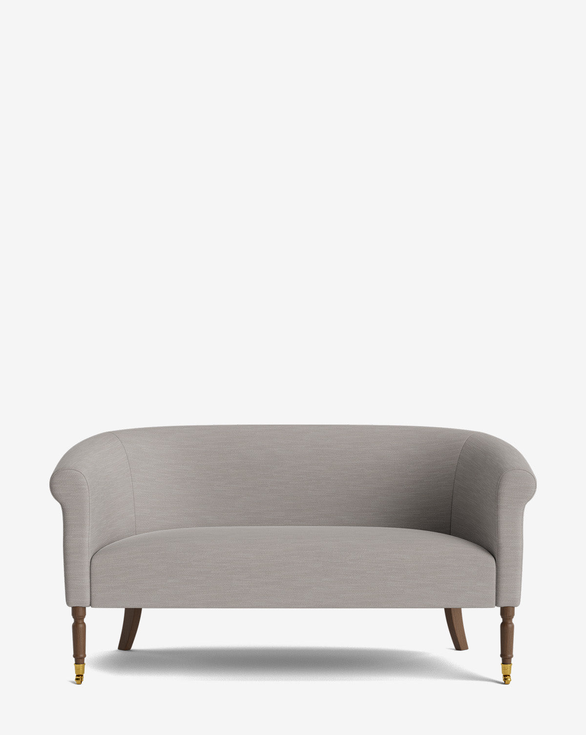 The Clemence Settee 60 features light gray designer fabric, rounded arms, wooden legs with brass front casters, and is set against a plain white background—perfect for enhancing any living space by McGee & Co.