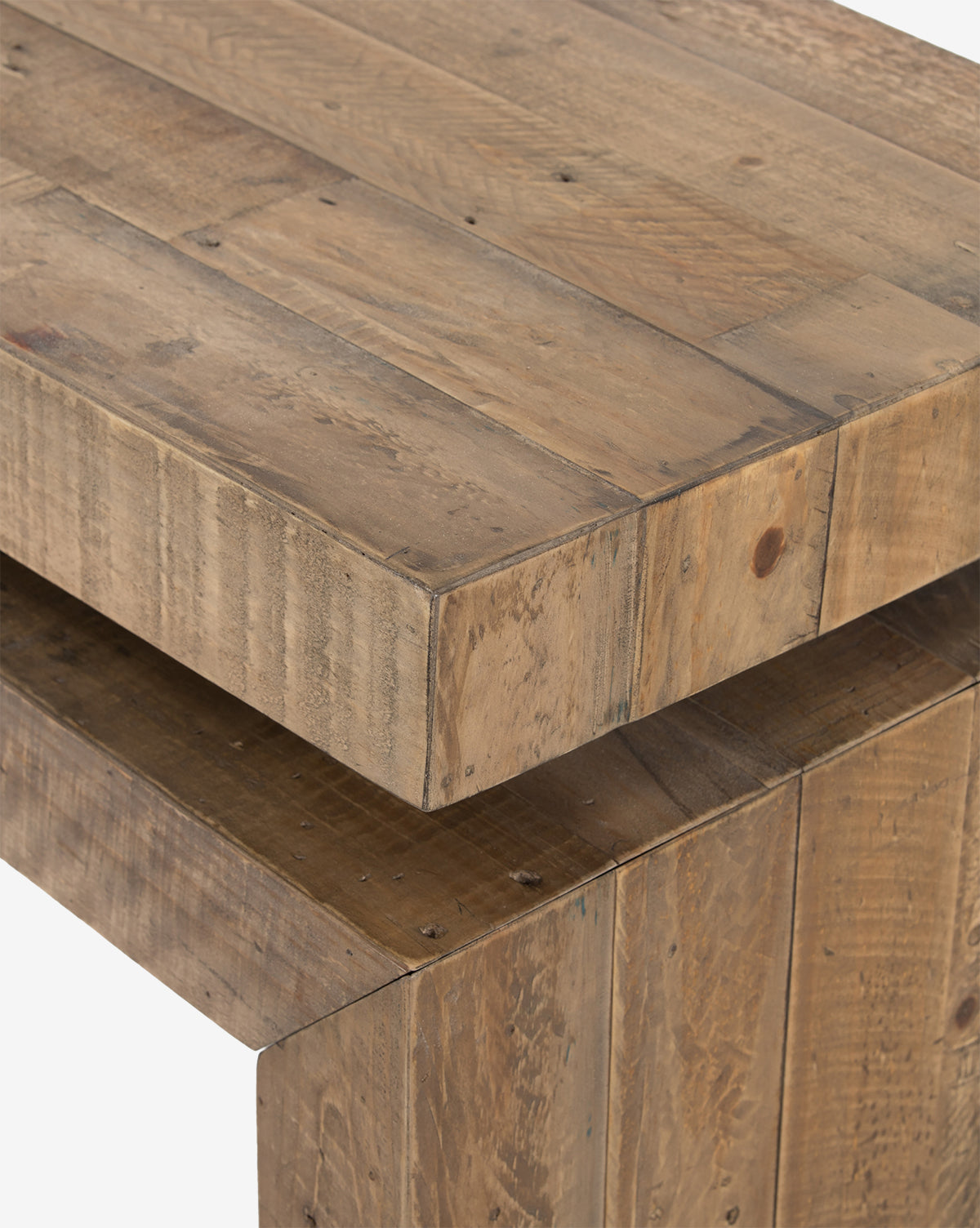 Close-up of two stacked, rectangular reclaimed wood slabs with unfinished texture and visible grain. Their rustic, natural look adds character—ideal for crafting a modern entryway piece like the Colter Console Table, by McGee & Co.
