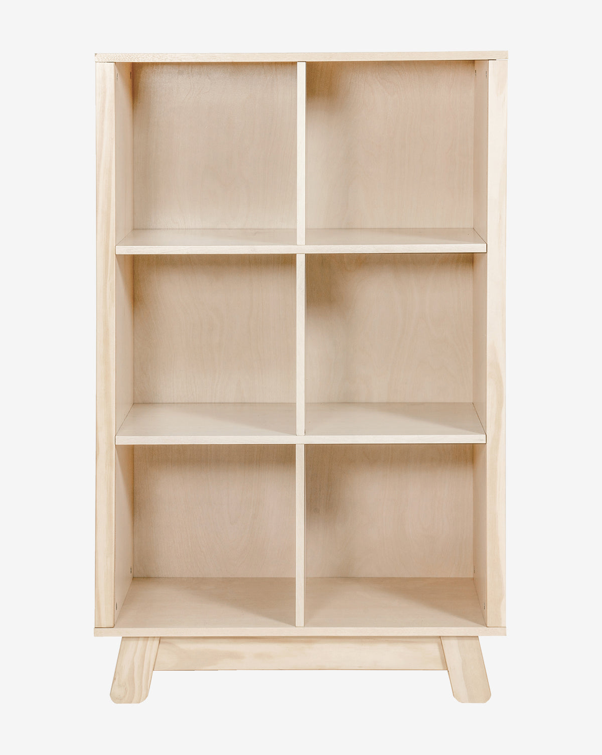 The Hudson Bookcase is a light wood nursery bookcase made from sustainable New Zealand pine, featuring six rectangular cubby compartments (two columns by three rows) and standing on a flat base against a plain white background, by McGee & Co.