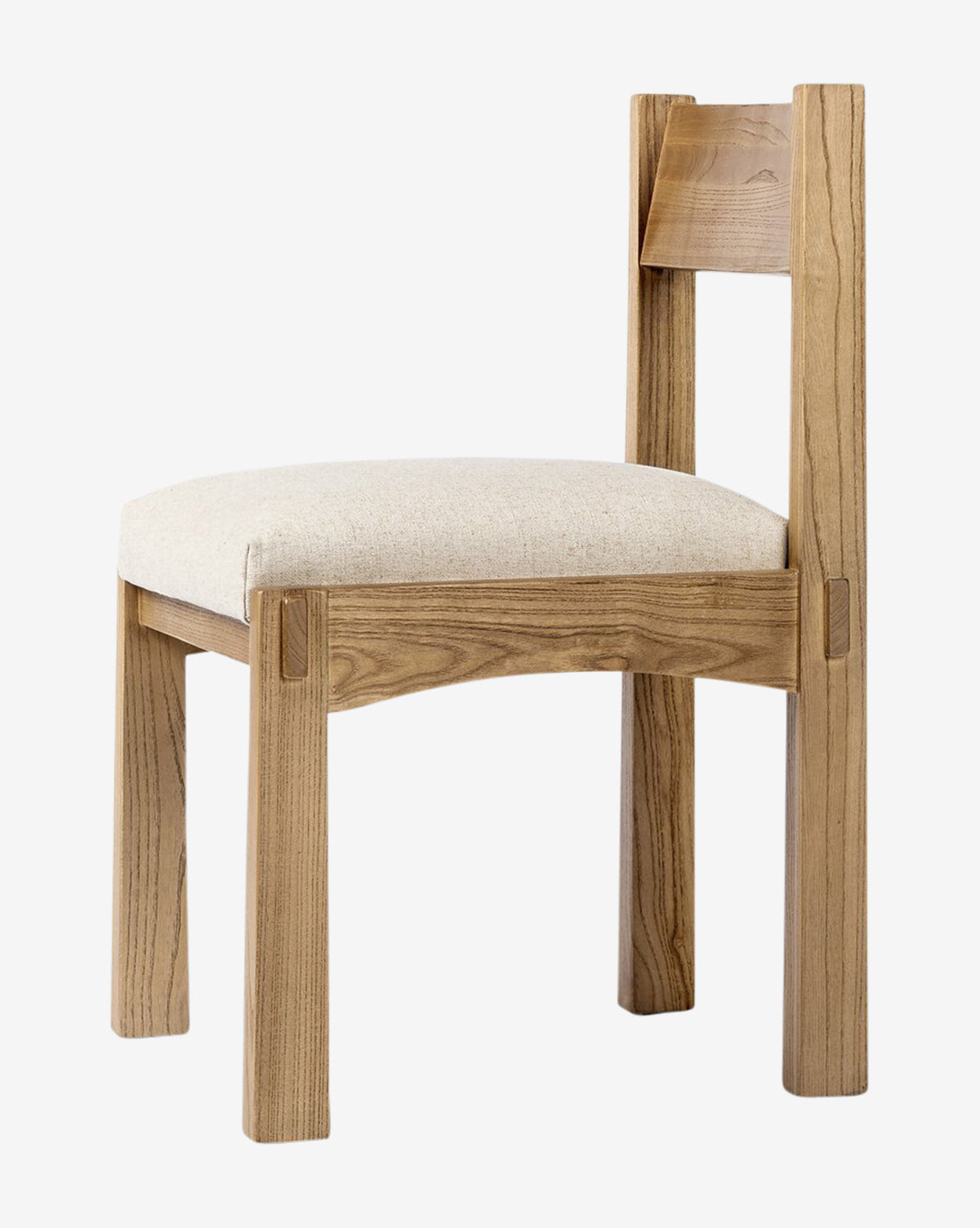 The Cyprian Dining Chair boasts a sleek, modern style with straight legs, a rectangular back, and a light padded seat cushion in performance fabric—an ideal choice for any dining space, by McGee & Co.