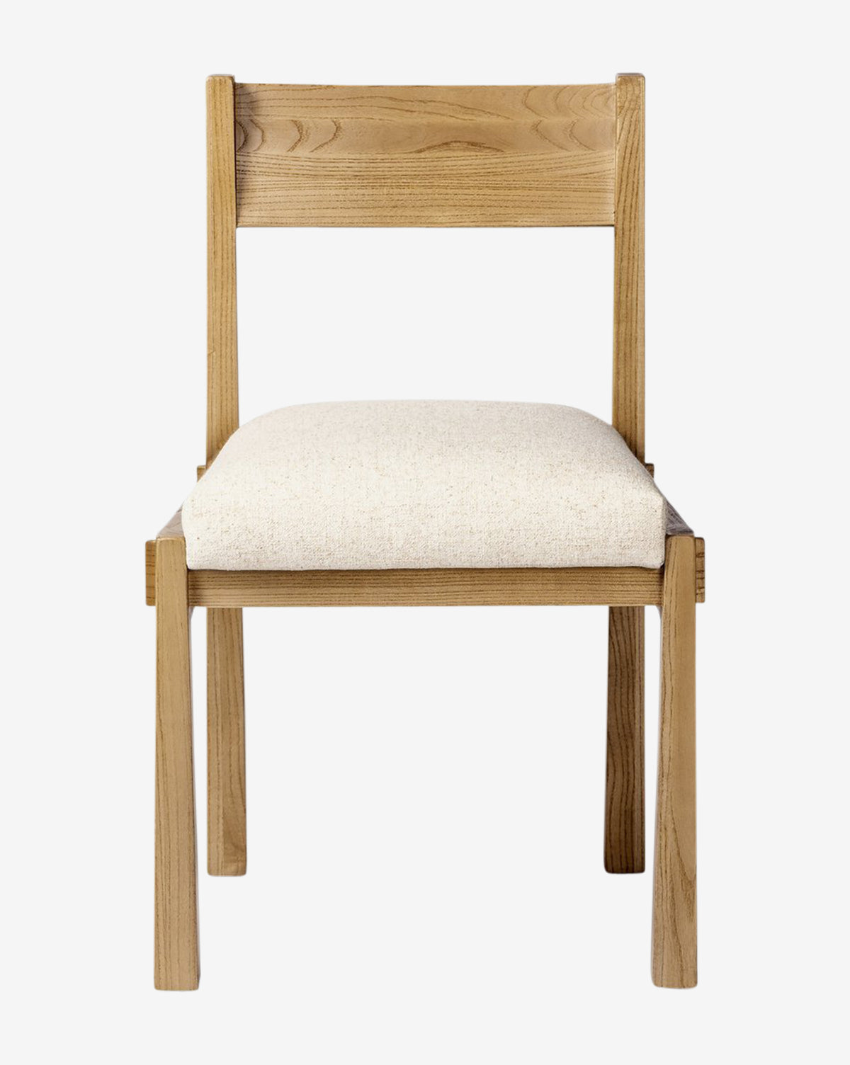 The Cyprian Dining Chair features a simple wood frame, a straight backrest, and a light beige cushioned seat, displayed from the front against a plain white background, by McGee & Co.
