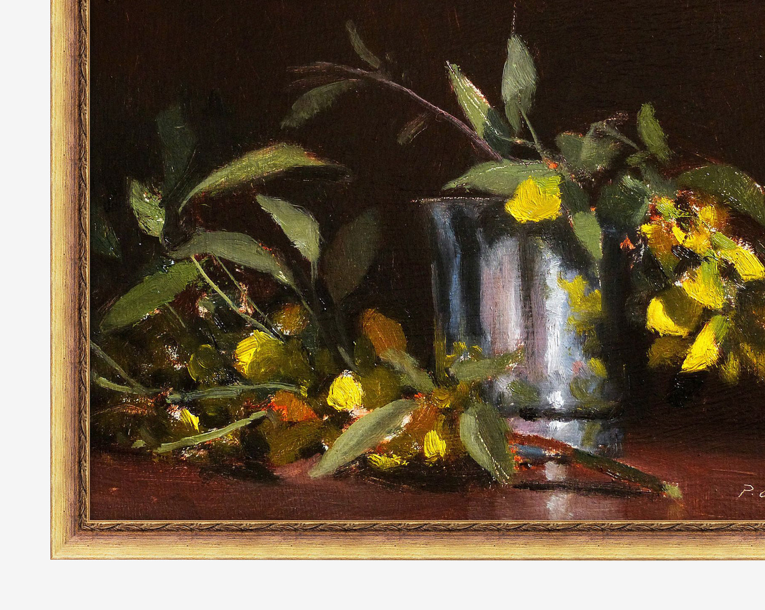 The “Cytise Blossoms” still life features green leaves and yellow flowers surrounding a reflective silver cup on a brown surface, all presented in an elegant gold wood frame, by McGee & Co.
