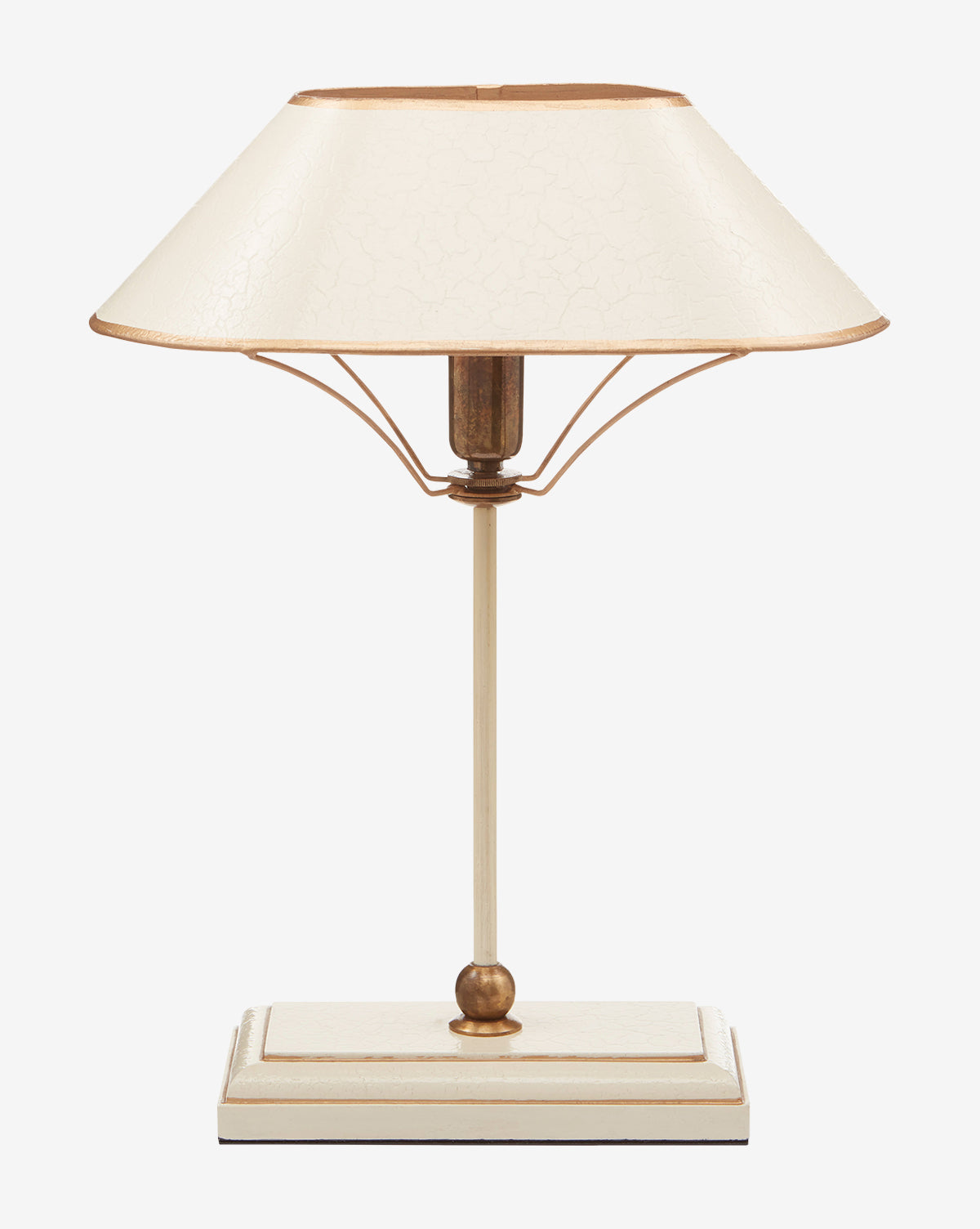 The Daphne Table Lamp has a wide cream shade, slim stem, and rectangular base with gold accents—ideal decorative lighting for any room, by McGee & Co.
