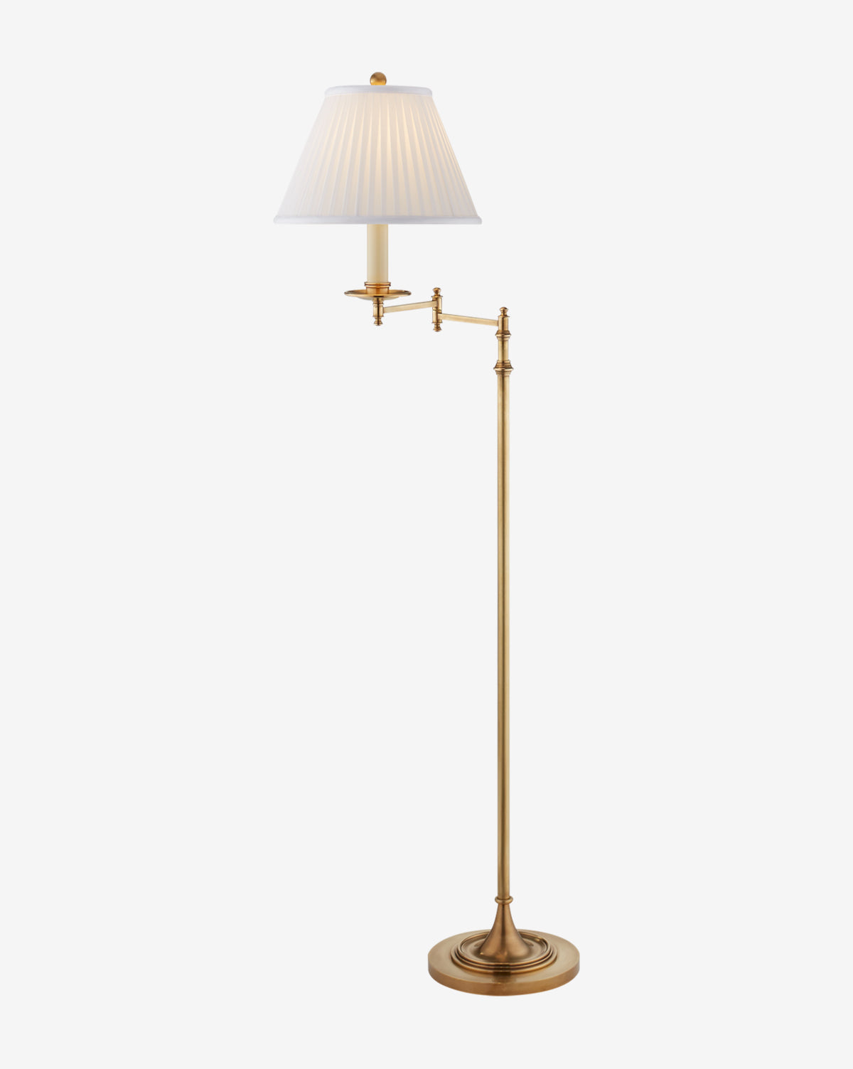 The Dorchester Swing Arm Floor Lamp by Visual Comfort & Co. Signature features a round base, slender adjustable swing arm, and white pleated shade in an antique brass finish, shown against a plain white background. McGee & Co.