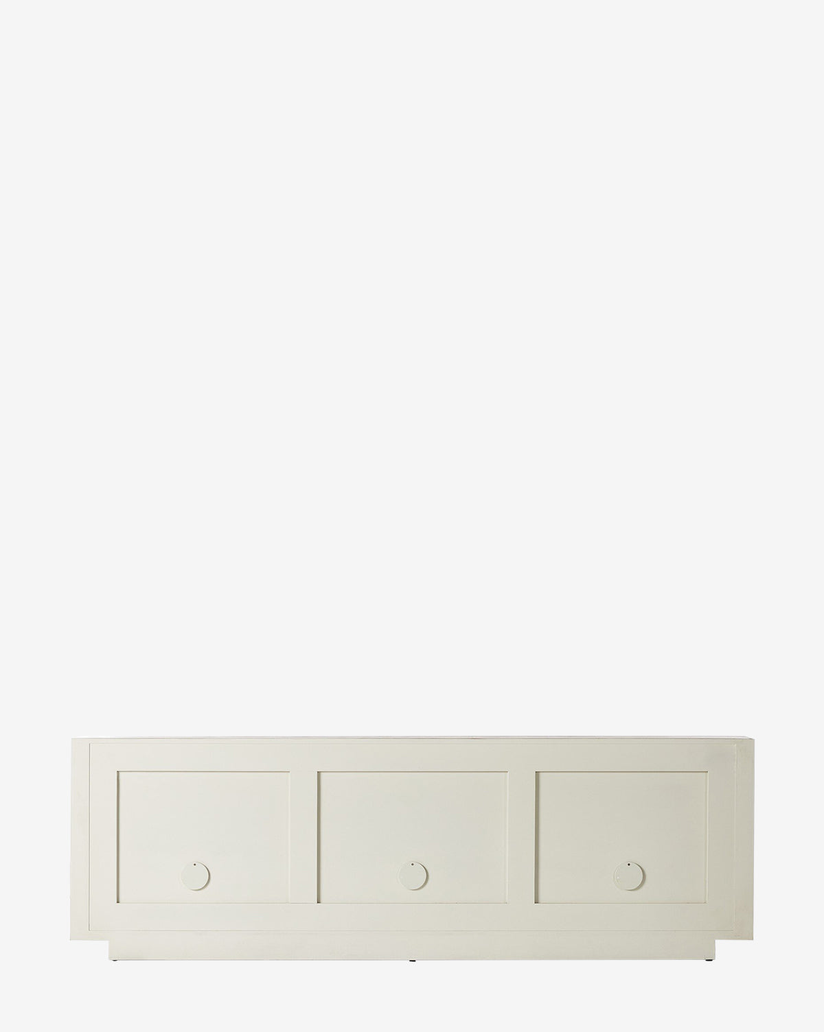 The Drayton Sideboard is a white, rectangular storage bench with three textured doors and circular cut-out handles, ideal for organizing your space and adding style to any room, by McGee & Co.