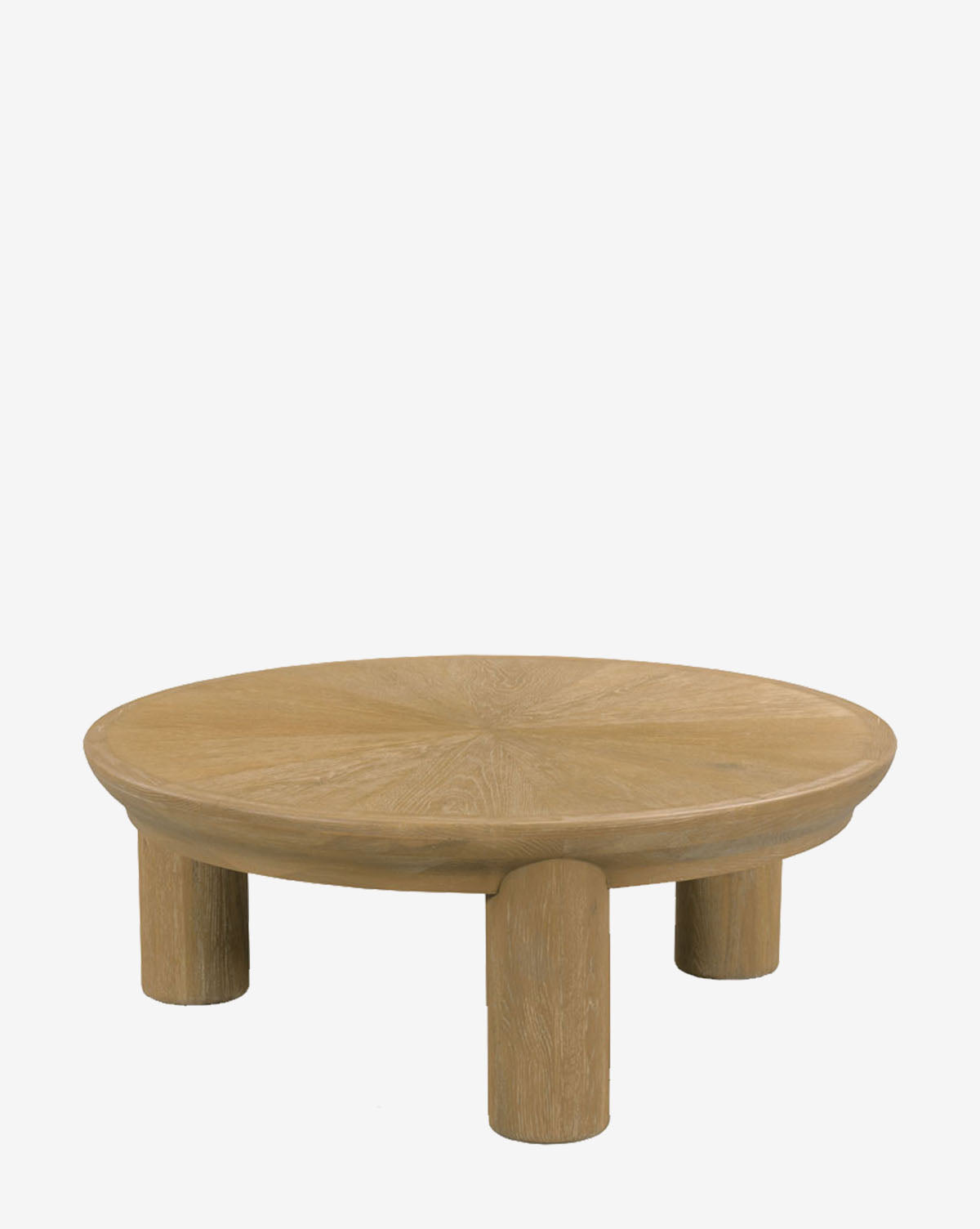 The Edwina Coffee Table showcases a modern round solid oak top and four chunky cylindrical legs, presented on a plain white background, by McGee & Co.