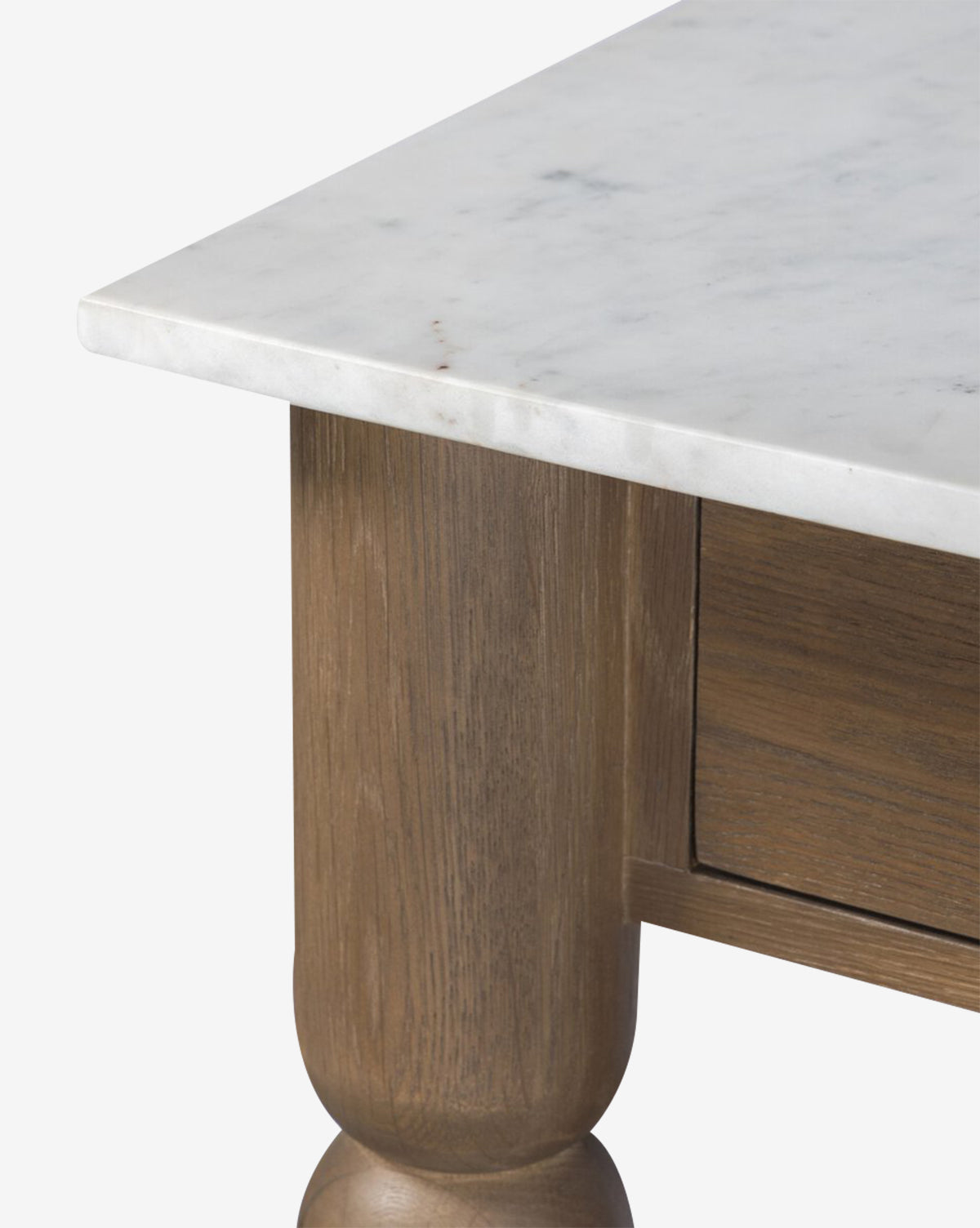 Close-up of the Eldric Kitchen Islands corner, showcasing its smooth marble tabletop and sturdy solid oak base, highlighting the natural wood grain and elegant marble surface, by McGee & Co.