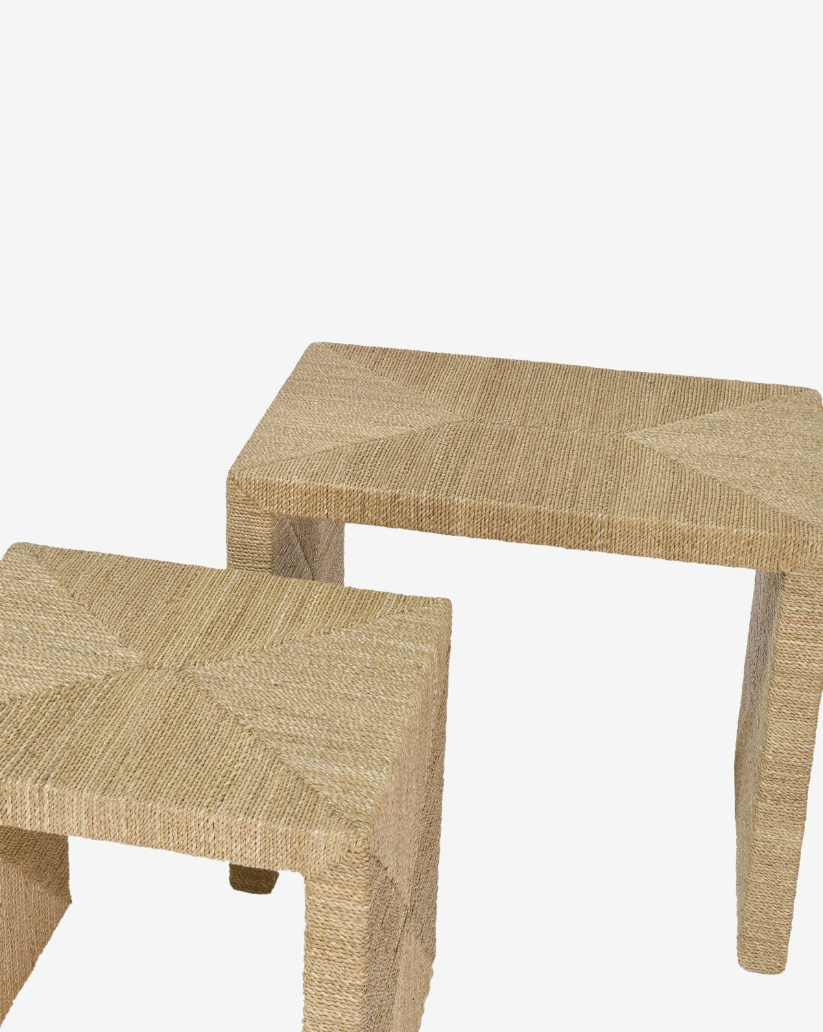 Two Ellie Nesting Side Tables of varying sizes are displayed side by side on a white background, showcasing textured lampakanai rope surfaces and a sleek, modern design by McGee & Co.