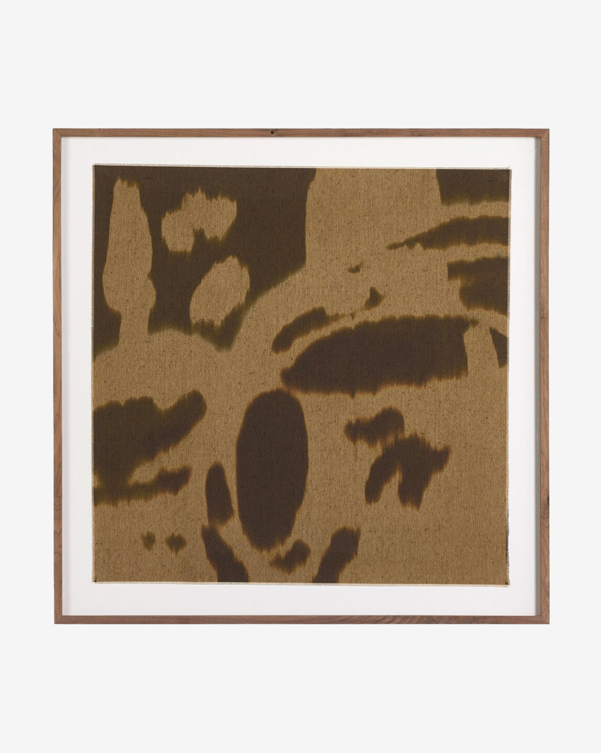 Enigmatic 2 by Shatha Al Dafai features abstract brown and tan organic shapes on raw canvas with a textured look, framed in wood with a white mat for a dynamic, camouflaged effect, by McGee & Co.