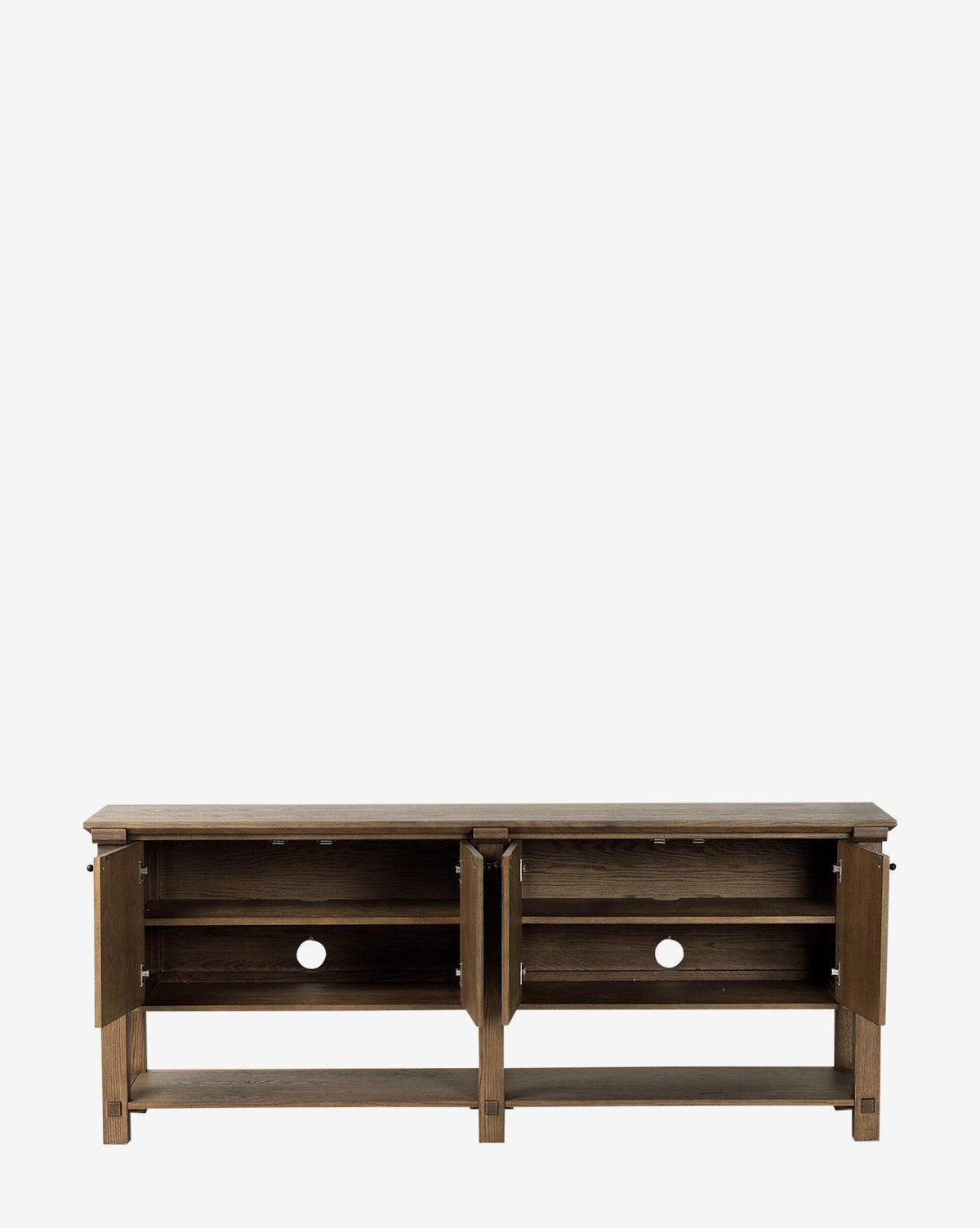 The Evaline Sideboard features a rustic brown finish, straight legs, and black iron hardware. Two open cabinet doors reveal shelves and circular cable management holes, combining industrial style with practical storage by McGee & Co.