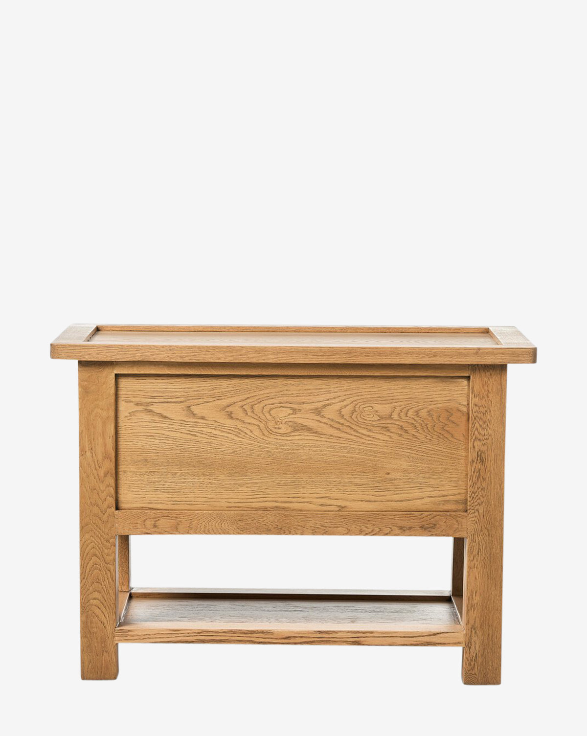 The Faelan Nightstand is a rectangular wooden piece with a flat top and open base shelf, featuring a natural light oak veneer finish with visible grain—ideal for bedroom styling, by McGee & Co.