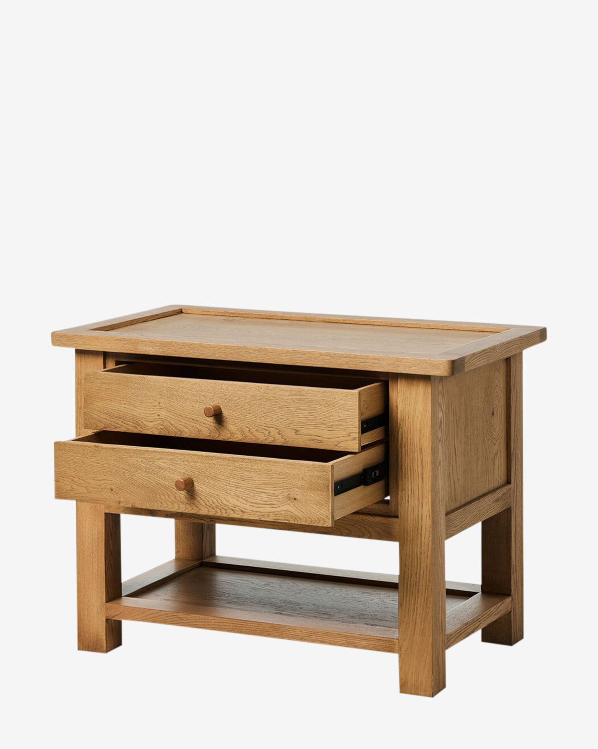 The Faelan Nightstand boasts a natural wood finish and light oak veneer, featuring two drawers (one partially open) and an open lower shelf—combining simplicity and sturdiness for stylish bedroom organization, by McGee & Co.