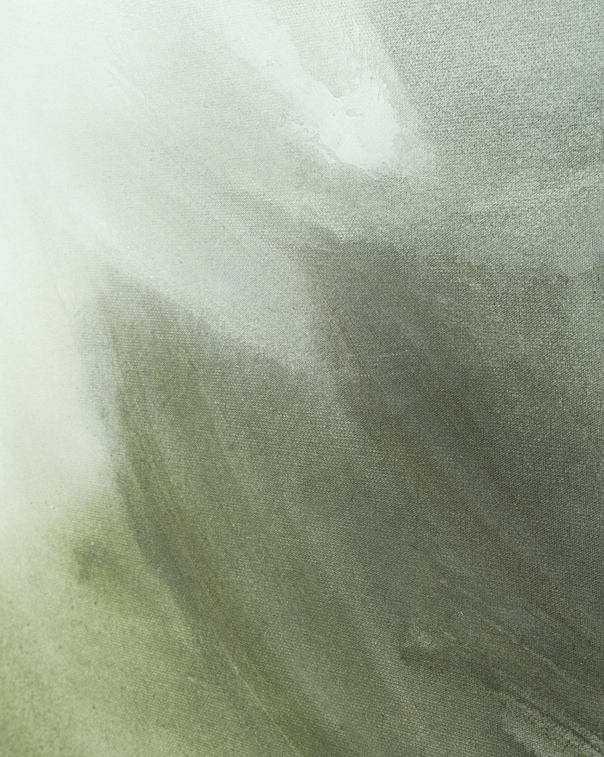“Fields of Green” is an abstract watercolor painting with soft, blended shades of green, gray, and white, creating a smooth, cloudy texture—perfect as canvas wall art to add gentle gradients and modern style to your space, by McGee & Co.