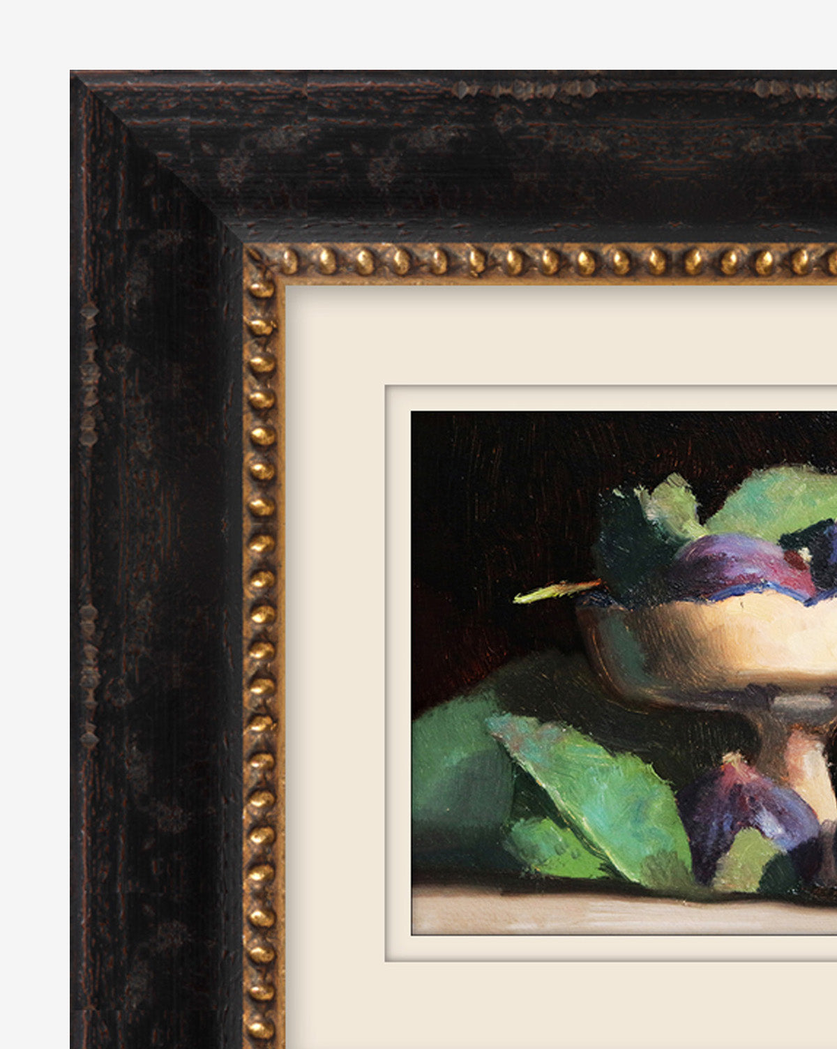 Close-up of Figs Still Life, a museum-quality painting with figs and green leaves in a shallow bowl. Displayed in a black and gold wood frame with beaded gold inner edge, matted with a cream border.