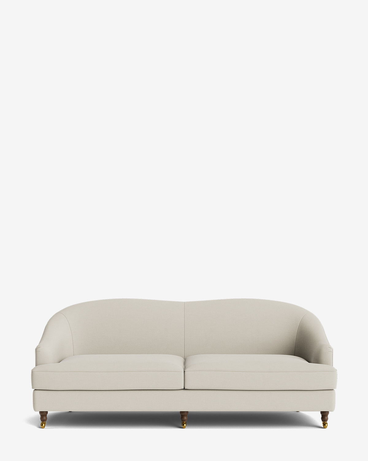 The Fletcher Sofa 76 is a modern, light beige handcrafted sofa featuring curved armrests and backrest, two seat cushions, and four short wooden legs with brass casters, shown against a plain white background by McGee & Co.