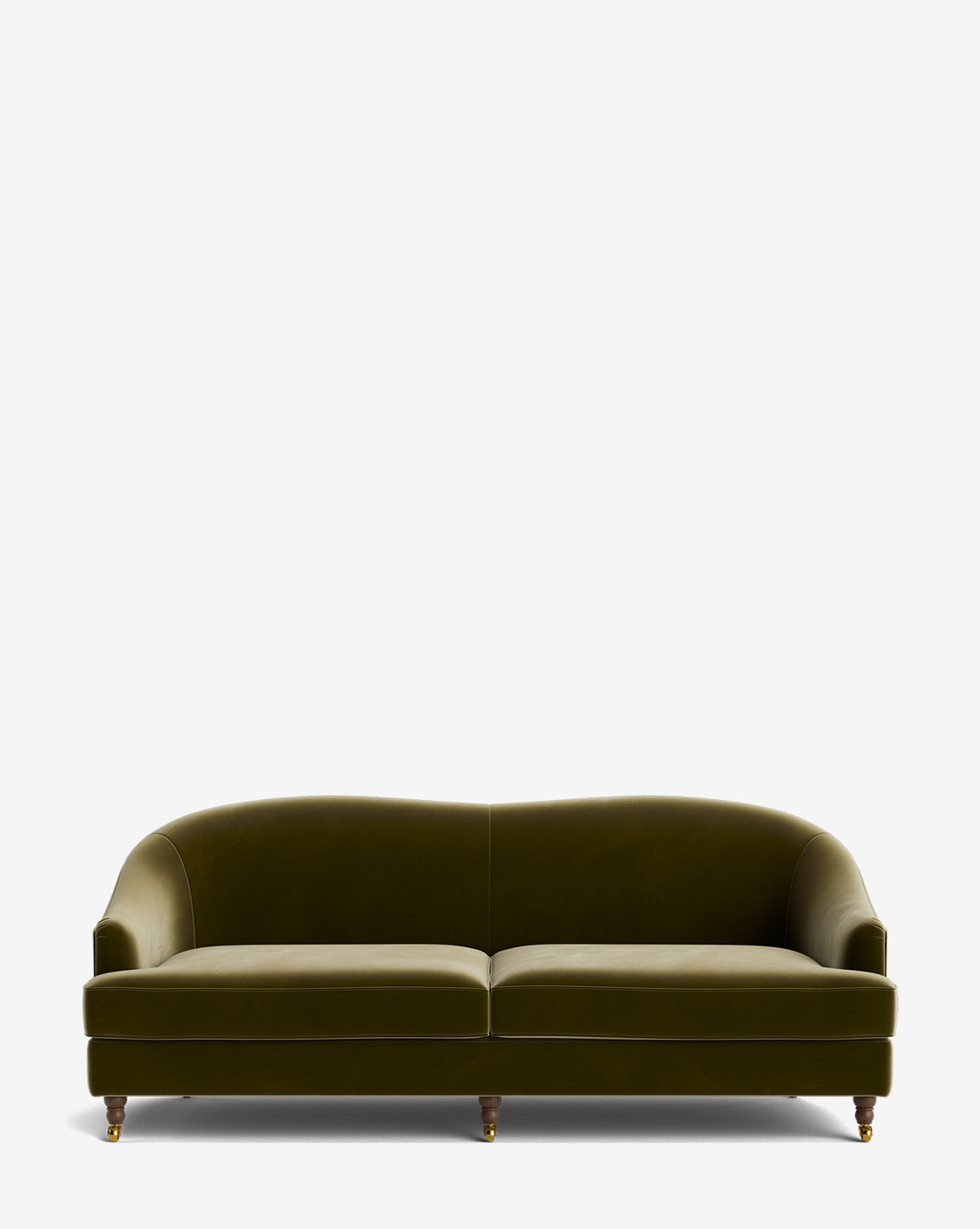 The Fletcher Sofa 76 is a green velvet, handcrafted sofa with curved arms and back, two seat cushions, and four rounded wooden legs with brass casters, shown against a plain white background by McGee & Co.