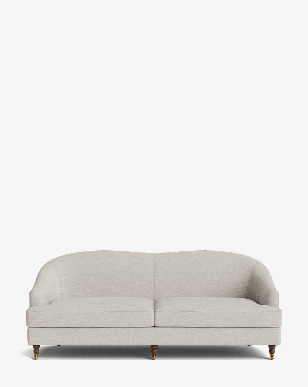 The Fletcher Sofa 76 is a modern, light beige upholstered, handcrafted sofa featuring a curved backrest, slim arms, and four short wooden legs with brass casters against a plain white background by McGee & Co.