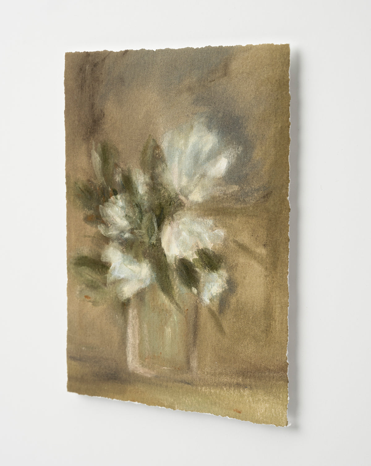 Flower Vase Still Life by Katie Mulder features soft-focus white flowers with green leaves in a vase on textured paper, set against a neutral background—an impressionistic piece ideal as a giclee print or framed in wood, by McGee & Co.