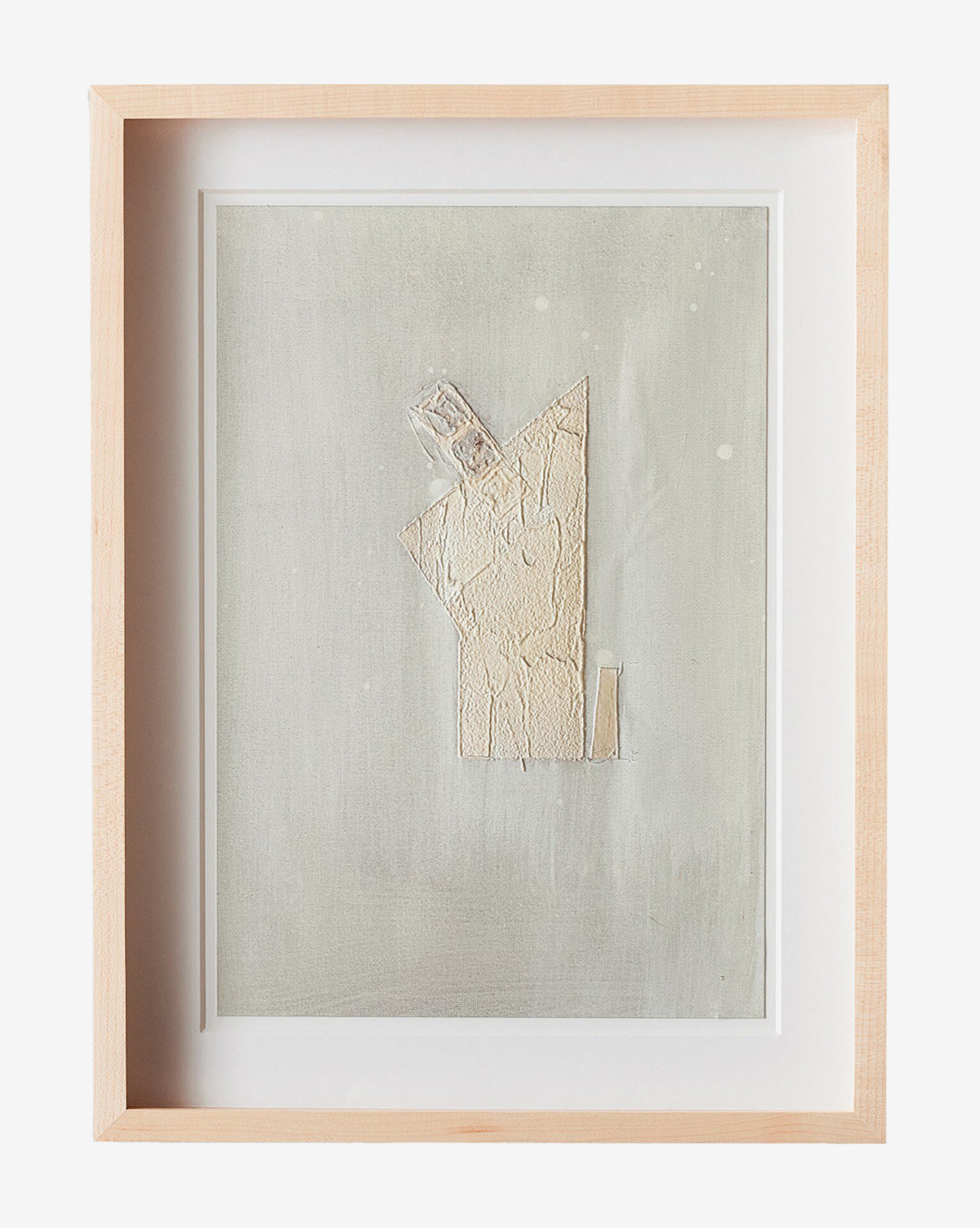 Galactic VII by Jade Dacay is a minimalist mixed media artwork in a natural-toned frame, featuring textured beige shapes on a pale gray background with geometric forms and subtle details, set in a crisp white mat, by McGee & Co.