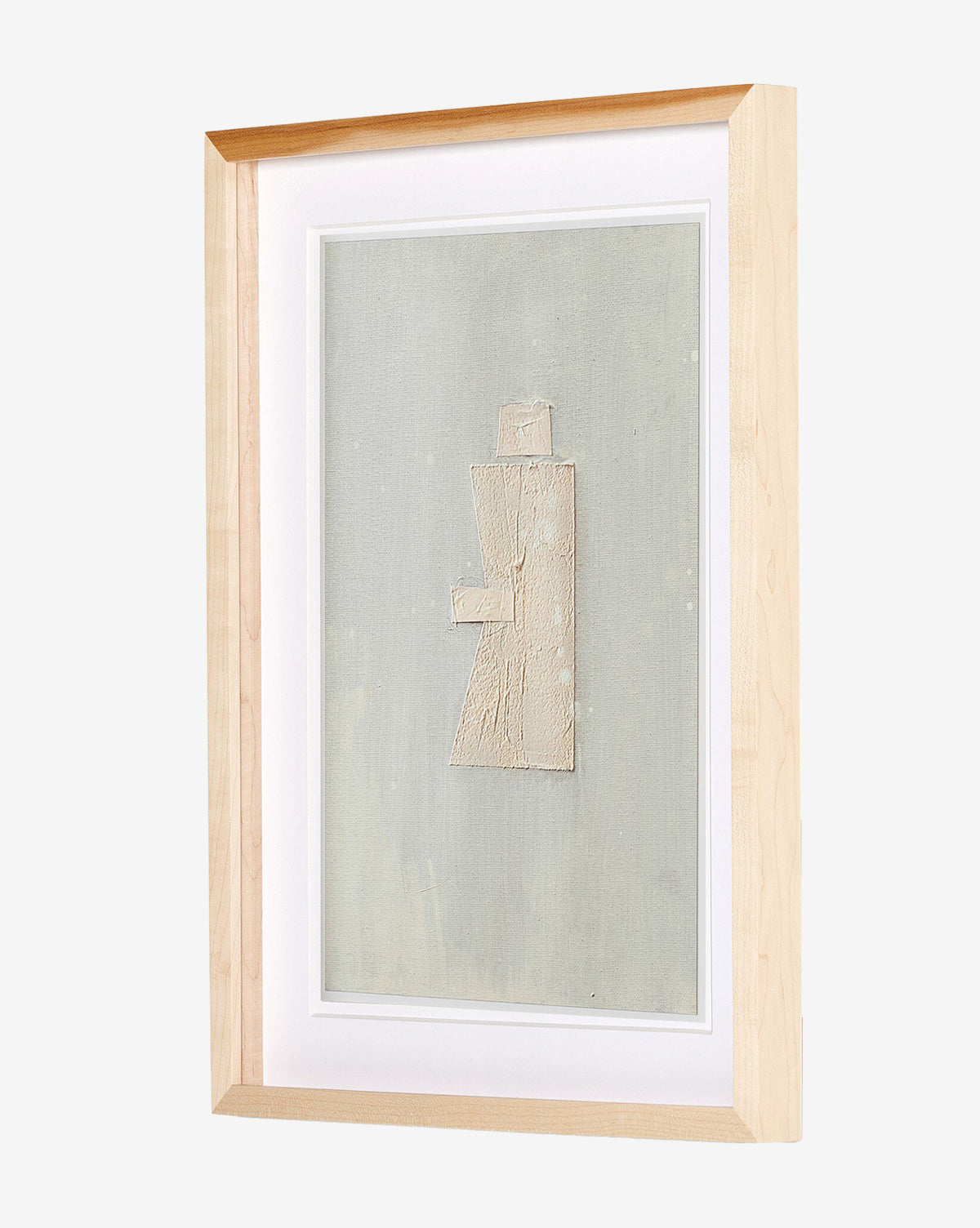 Galactic V by Jade Dacay is a minimalist mixed media artwork featuring textured beige shapes on a pale gray background in a natural-toned frame, displayed at an angle to highlight its depth and abstract style, by McGee & Co.