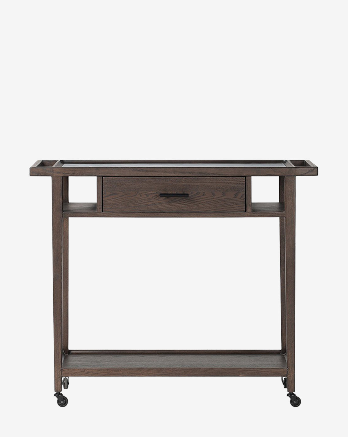 The Galen Bar Cart is a wooden, dark-finished rolling bar cart with a single center drawer, open shelf below, four small wheels for easy movement, and a rectangular frame for modern minimalist style by McGee & Co.